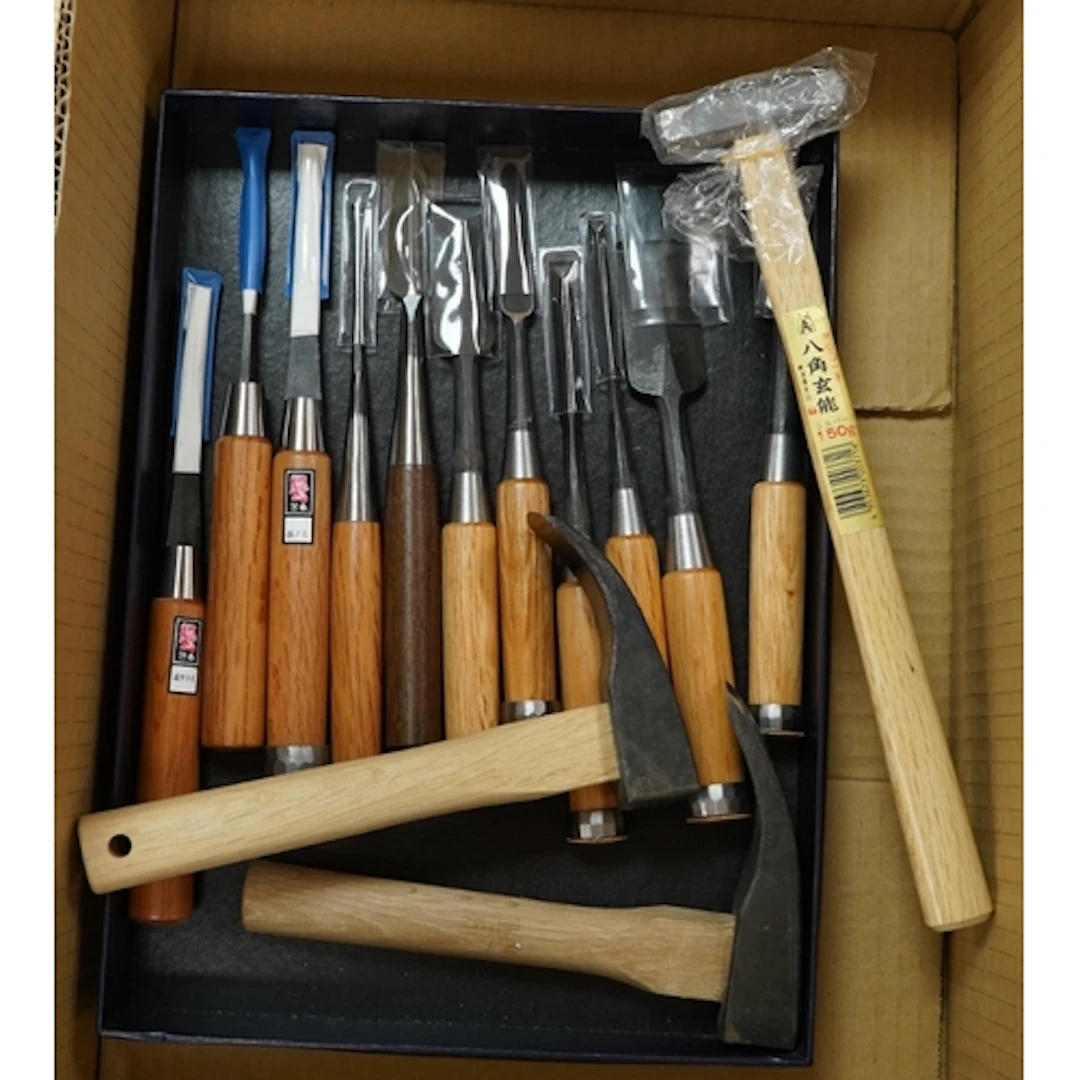 A set of ten Japanese bevel edge chisels, plus an additional...
