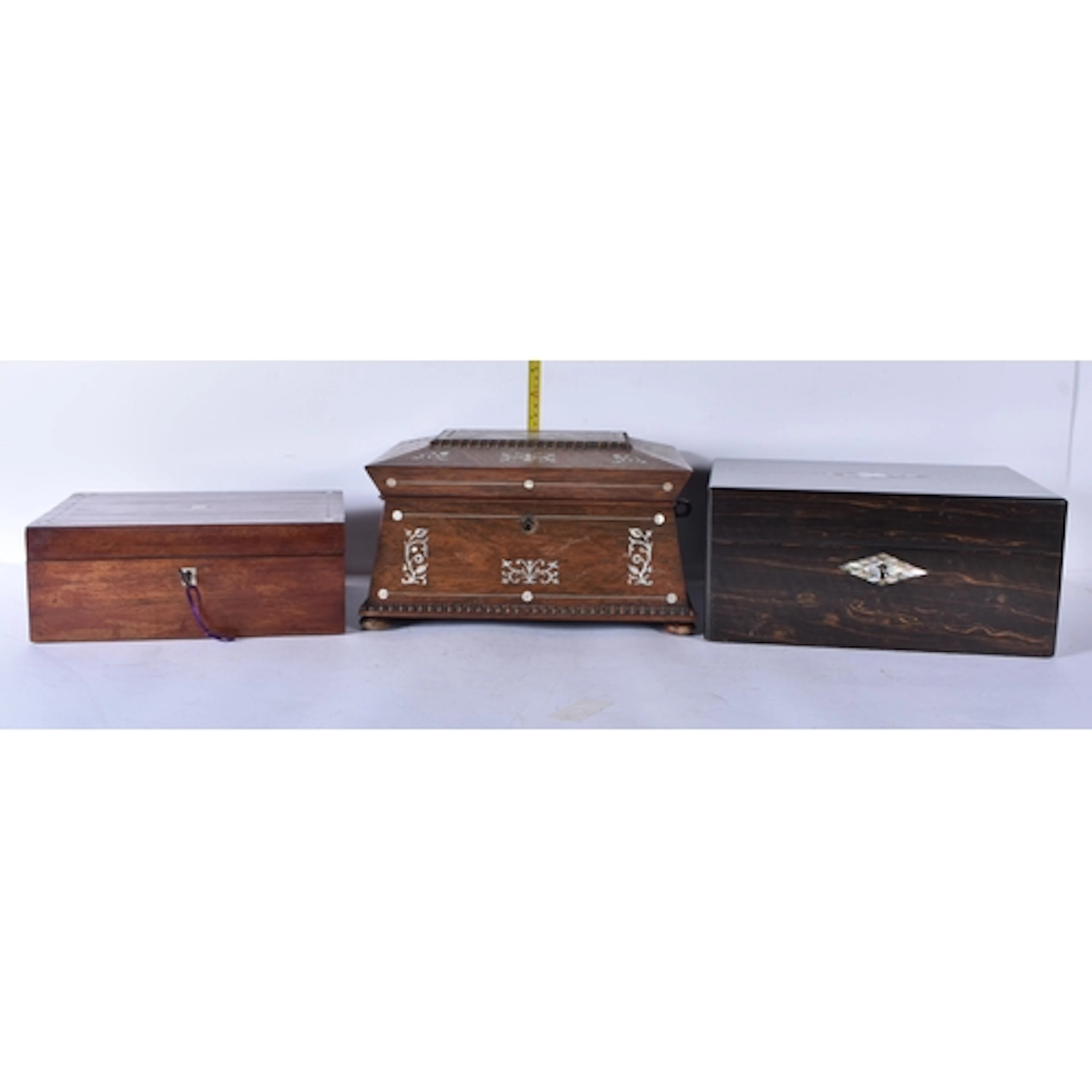A mahogany mother of pearl inlaid jewellery box together wit...