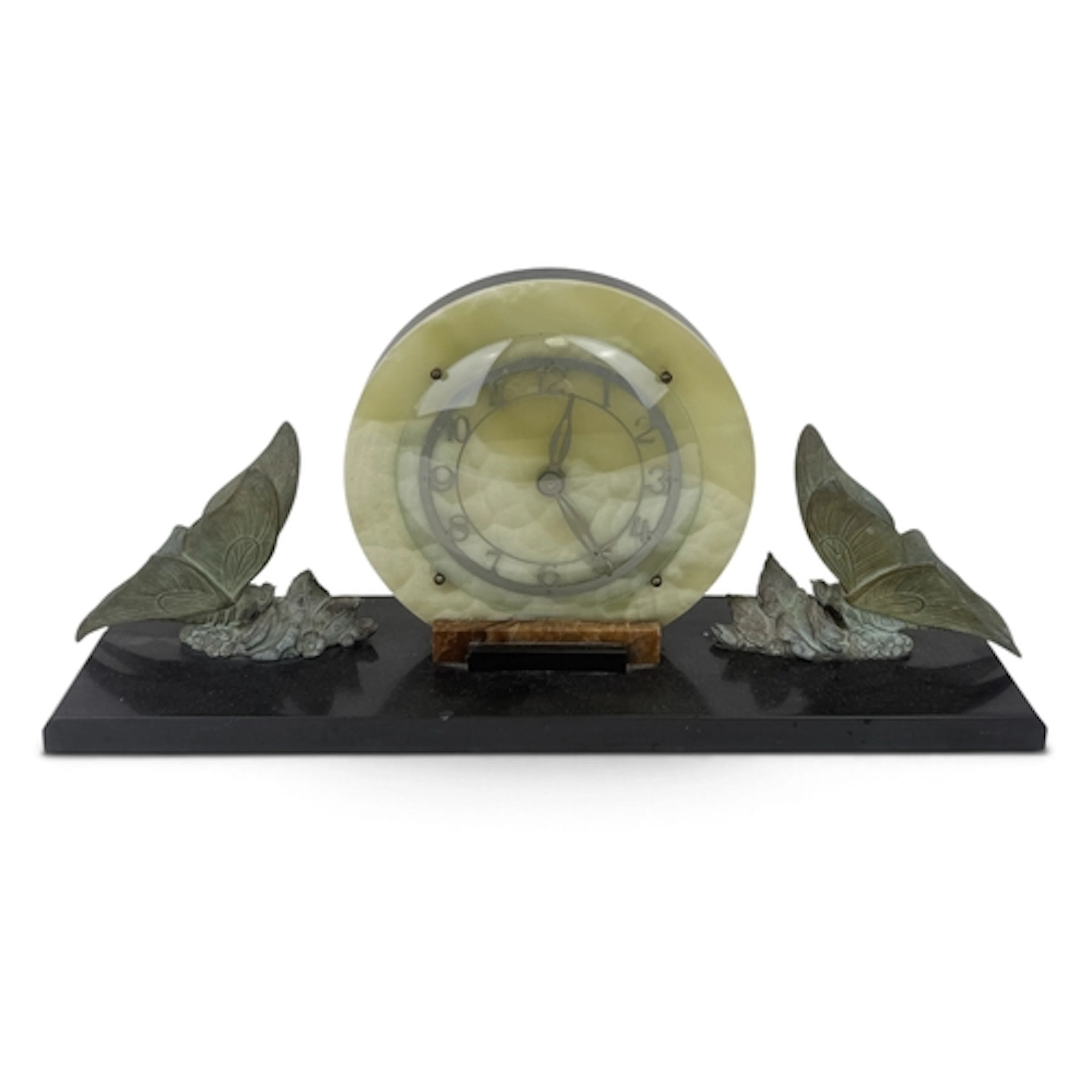 AN ART DECO ONYX MANTLE CLOCK WITH SPELTER BUTTERFLIES On a ...