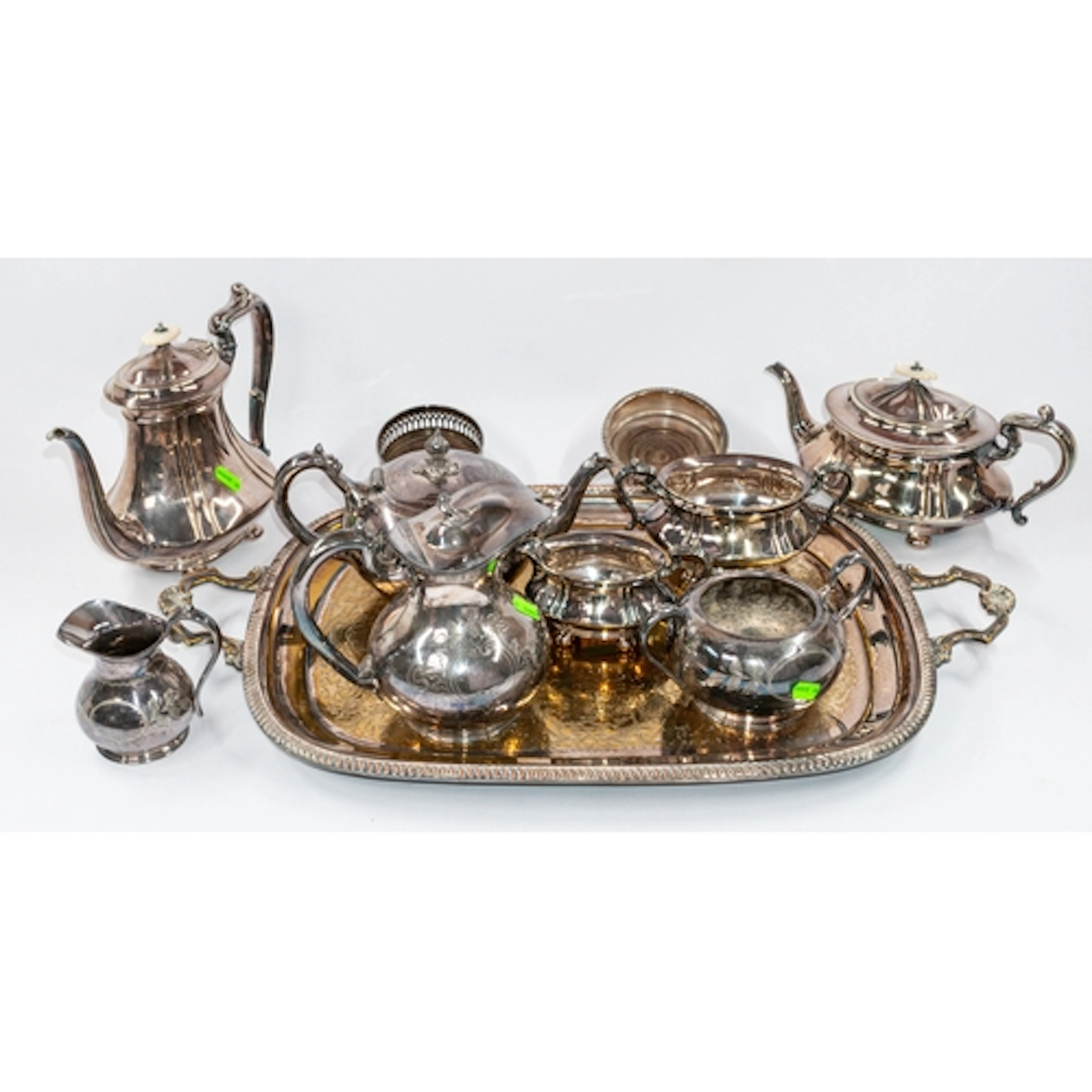 Silver Plate: a four piece tea set by Cooper Bros, with moth...