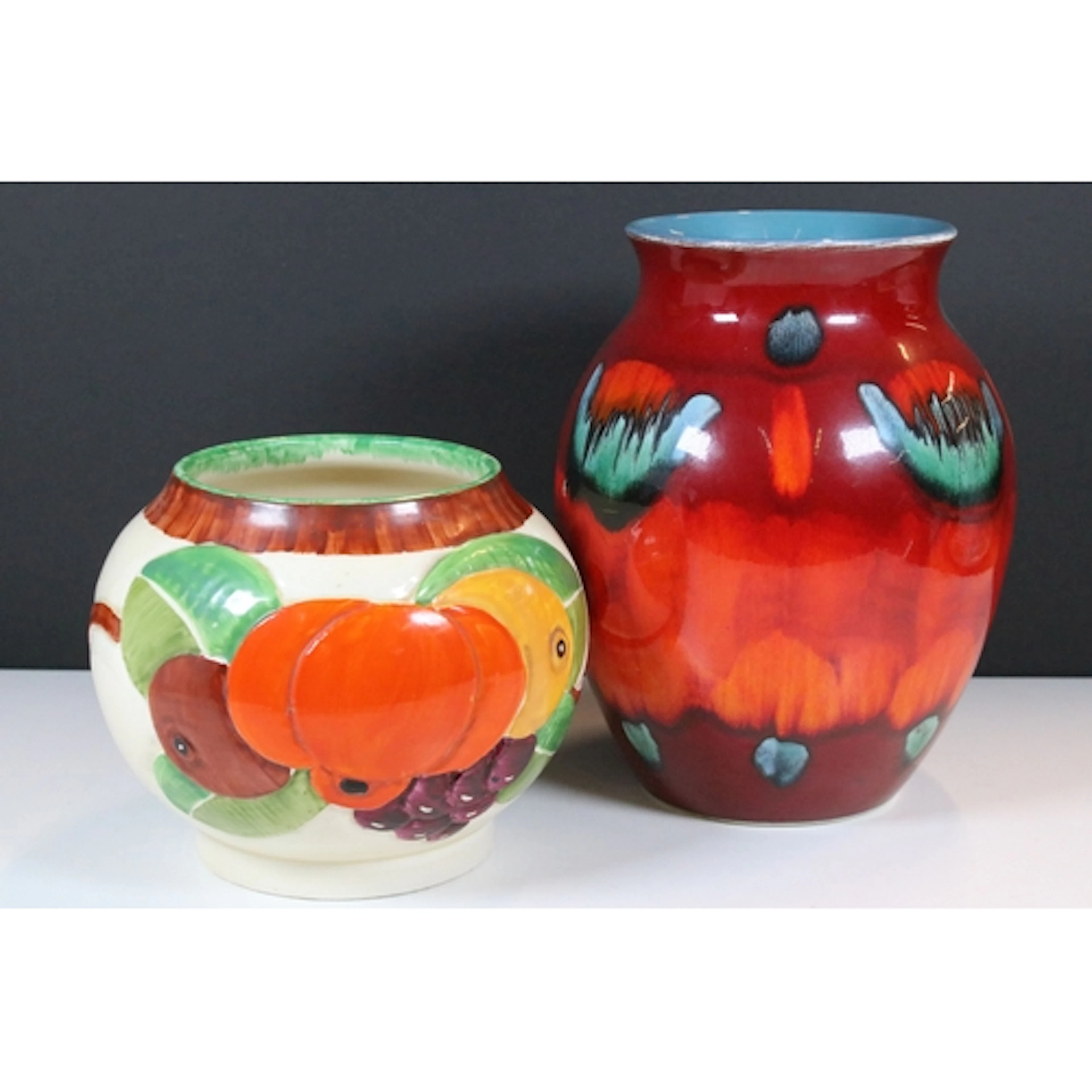 Poole Pottery 'Volcano' pattern vase, 24.5cm high together w...