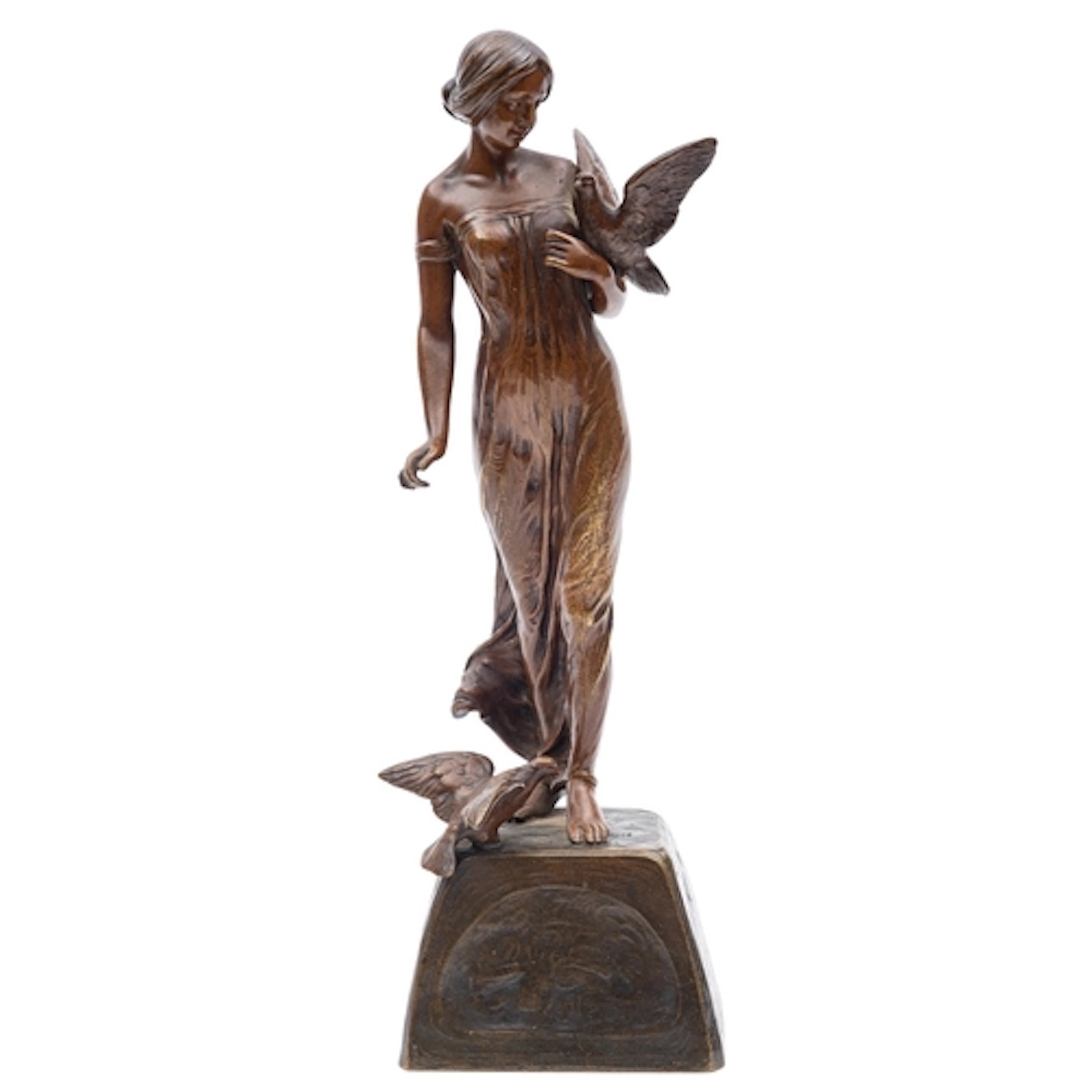 A Continental patinated bronze group of a maiden with doves,...