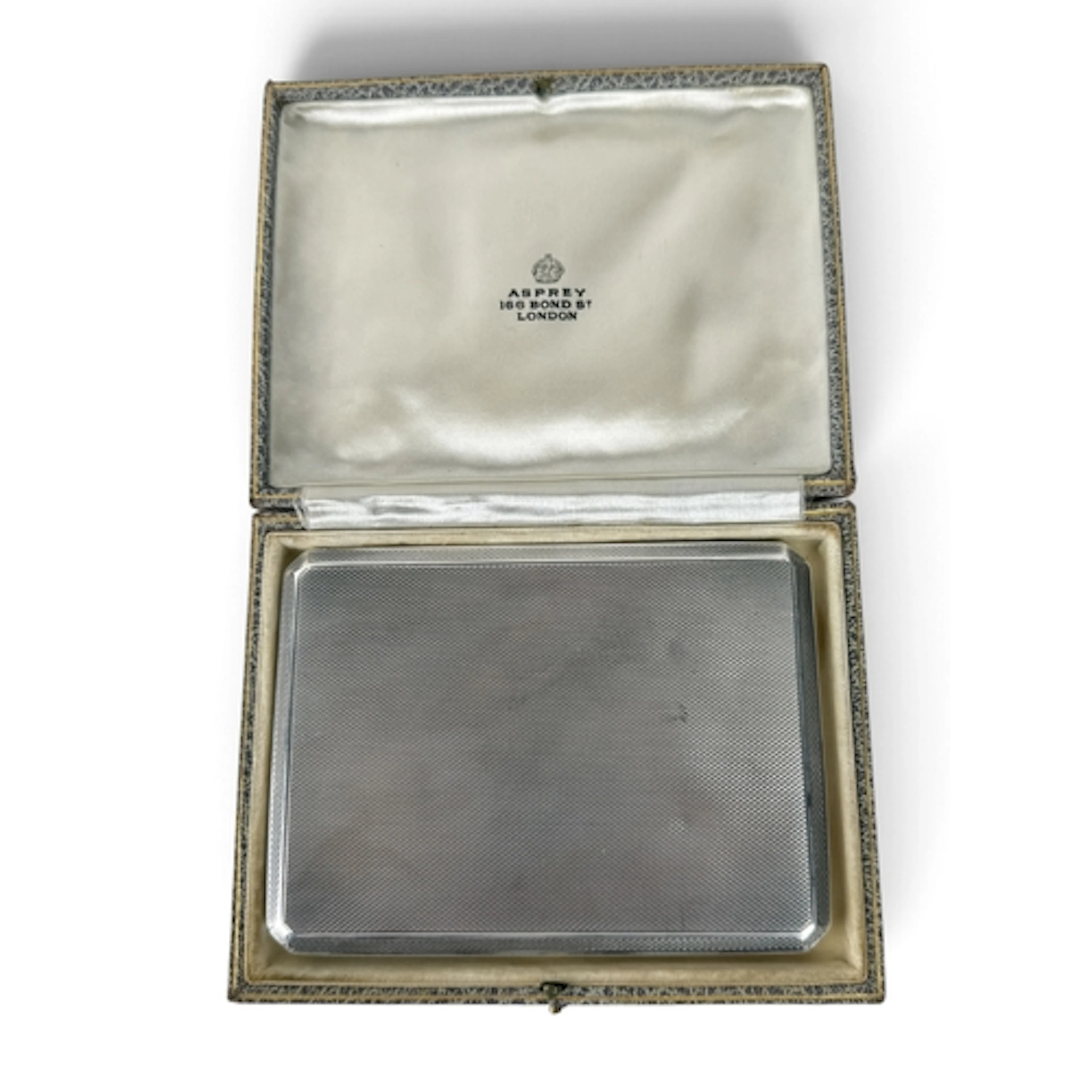 AN ASPREY AND CO SILVER ENGINE TURNED CIGARETTE CASE Weight:...