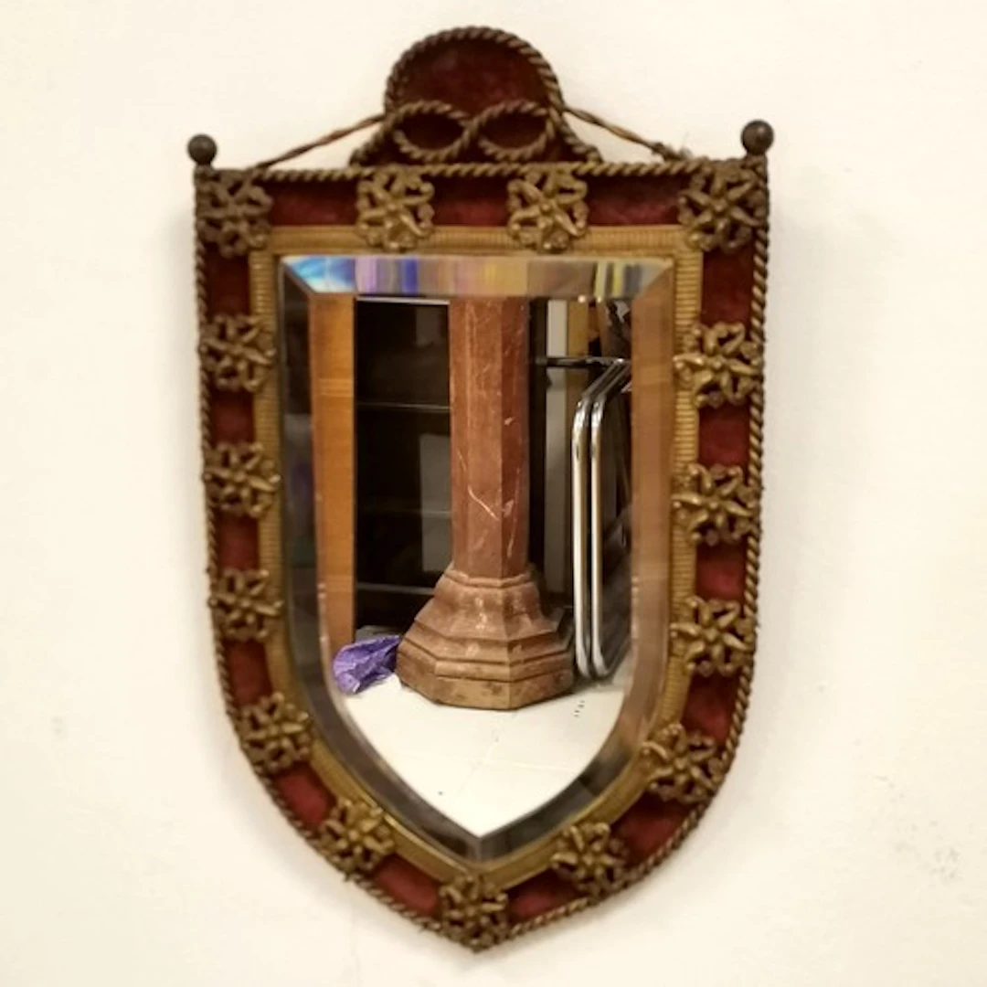 Antique shield design mirror with velvet border 39cm x 24cm