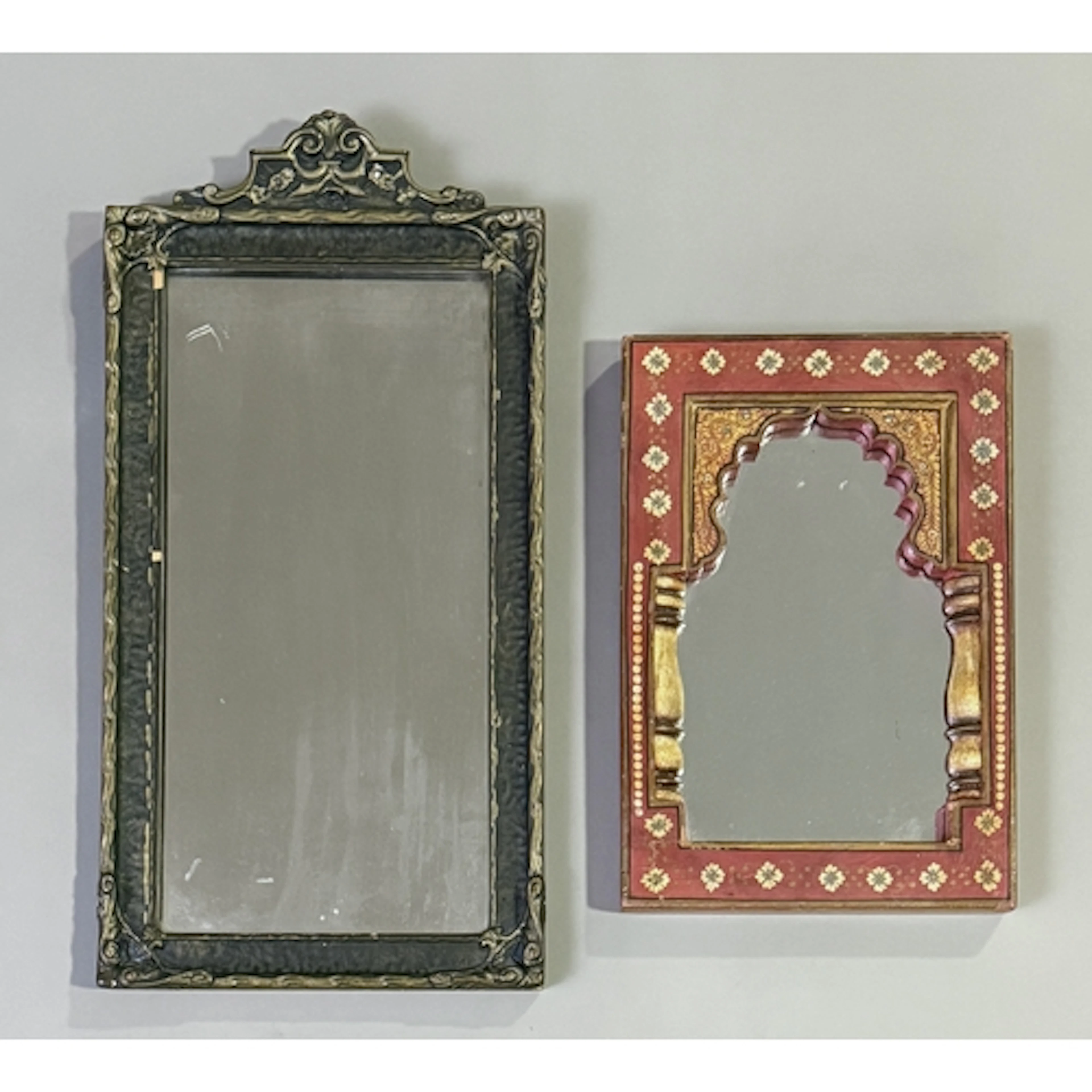 An Indian painted wooden mirror - the recessed plate within ...