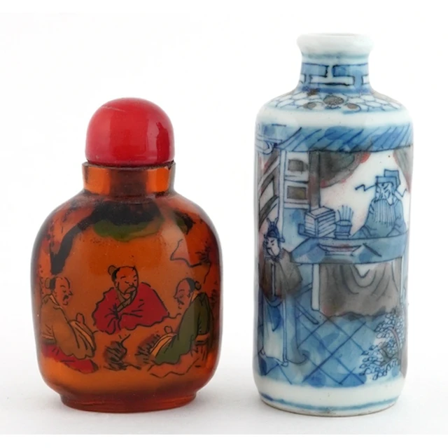 Two Chinese scent bottles comprising a porcelain blue and wh...