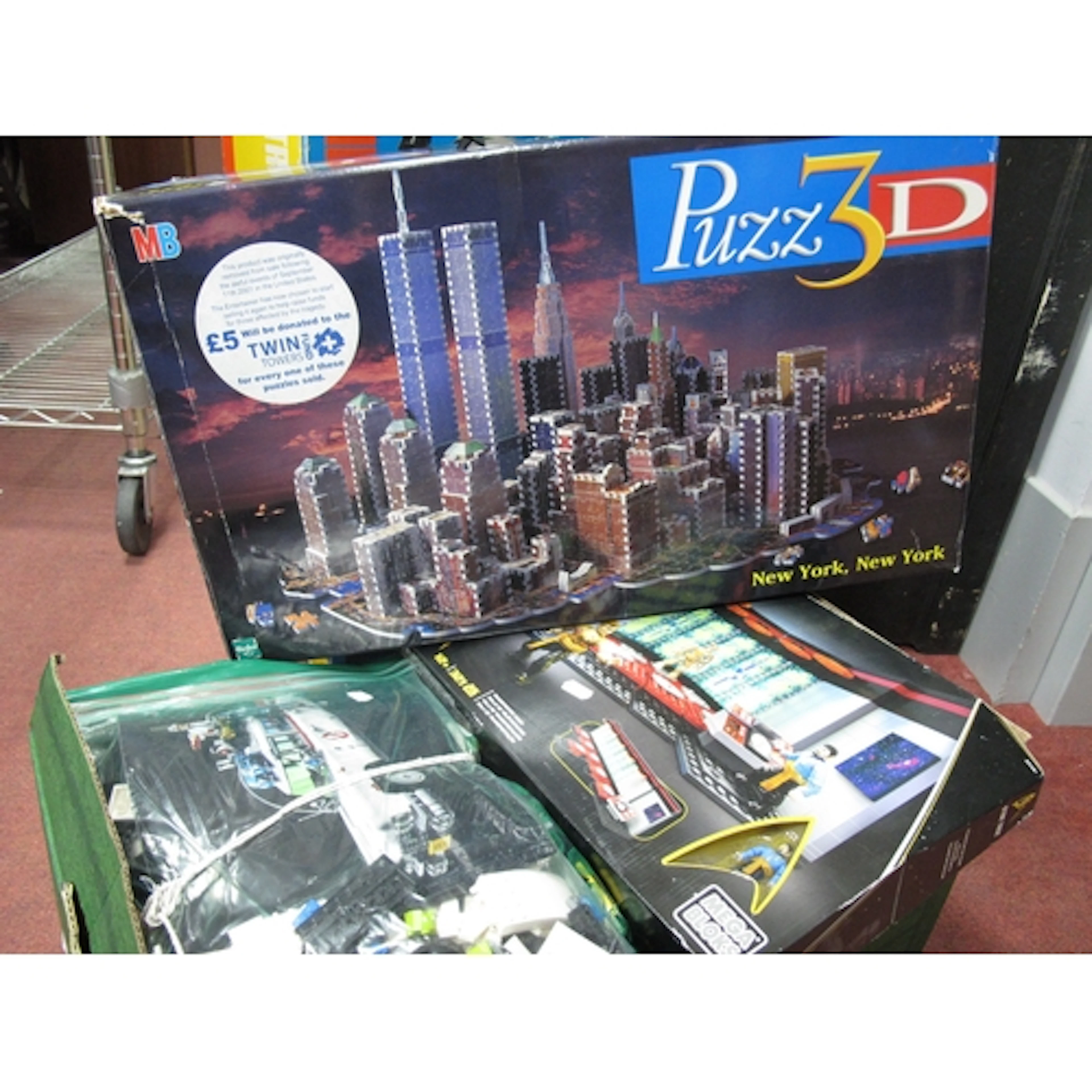 Building toys, including MB Puzz 3D New York, Mega Bloks Sta...