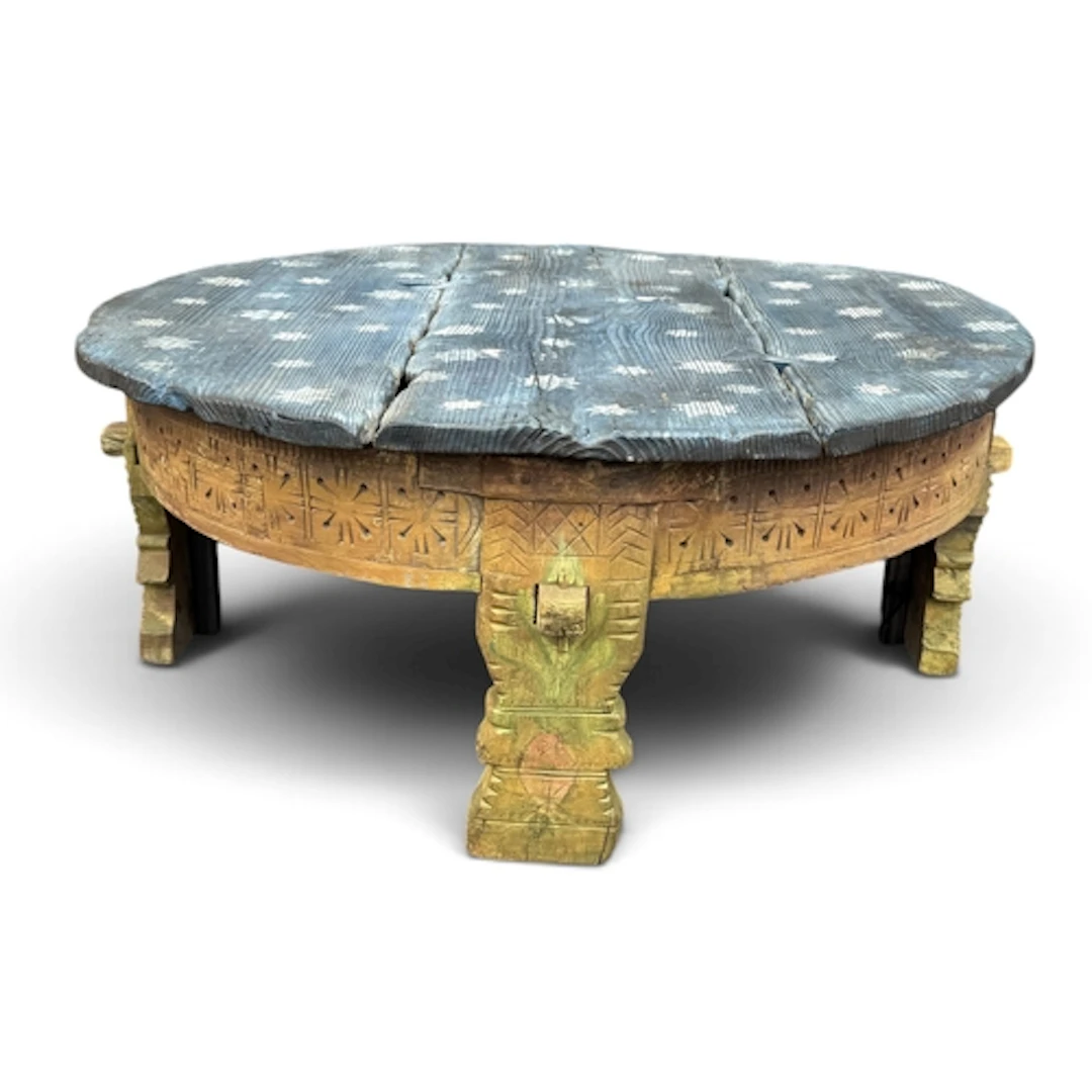 AN INDIAN CARVED AND PAINTED LOW TABLE The circular top of ...