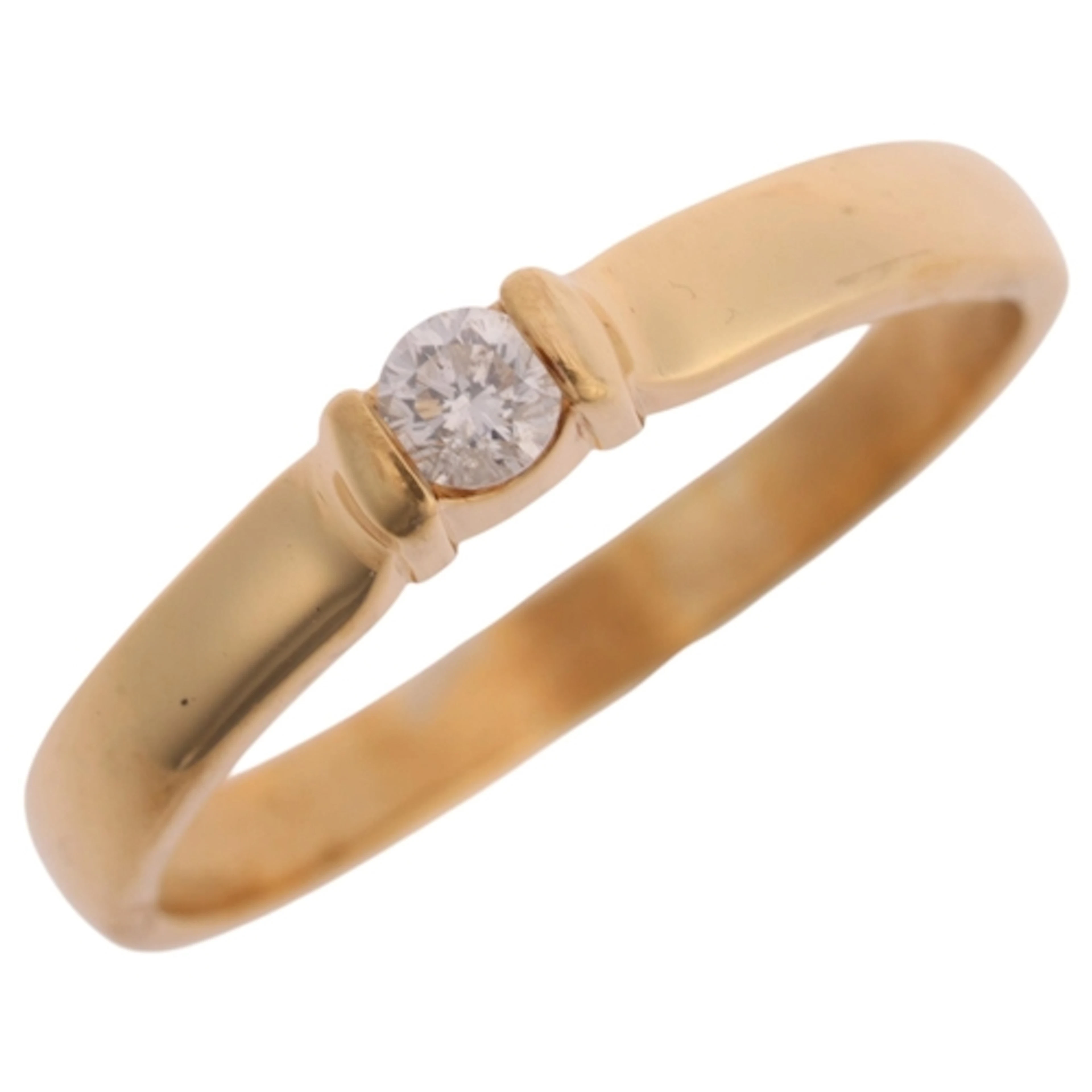 An 18ct gold 0.10ct single stone diamond ring, set with 0.10...