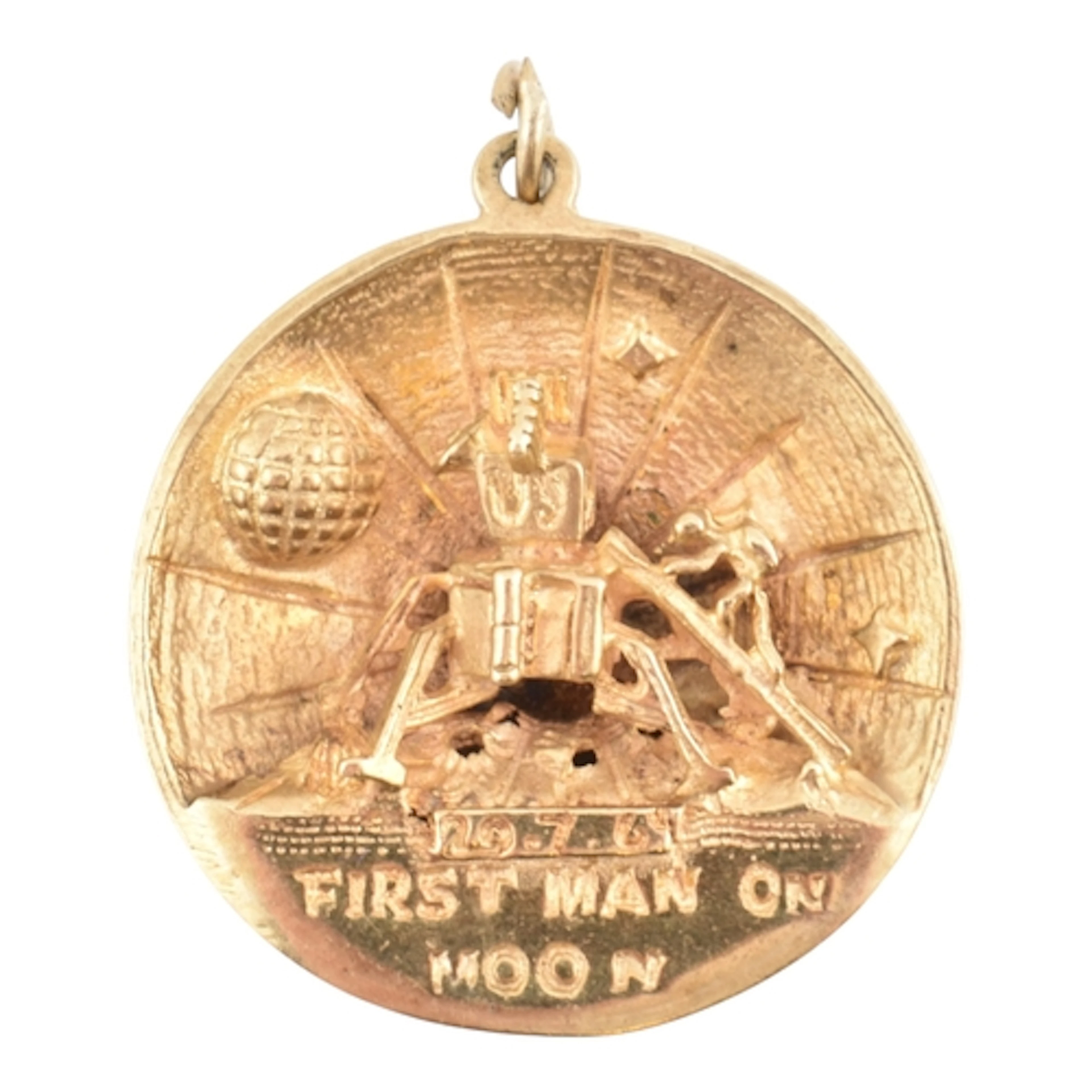 A hallmarked 9ct gold 'First Man on Moon', Apollo 11 necklac...