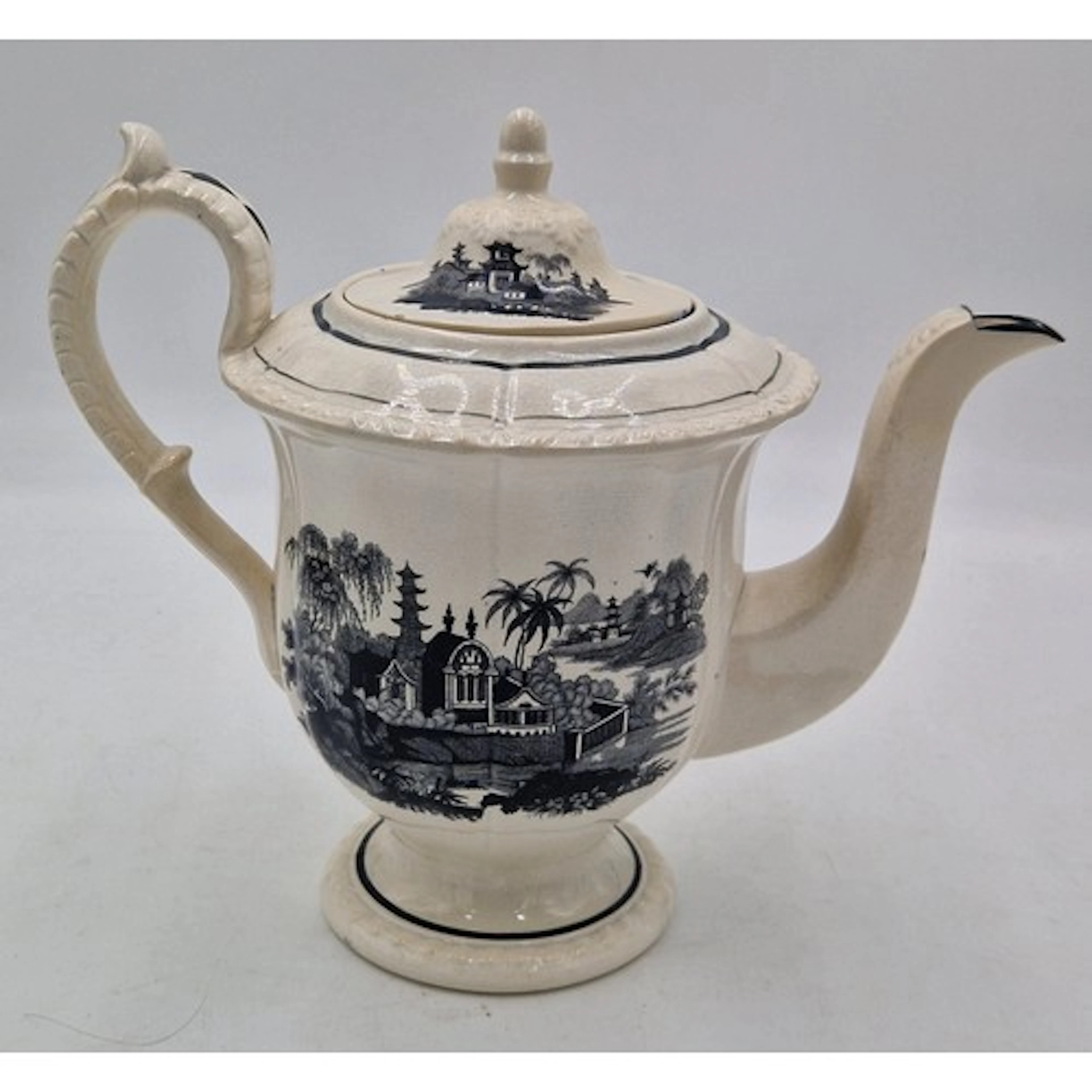 An early 19th century black and white transfer printed Swans...