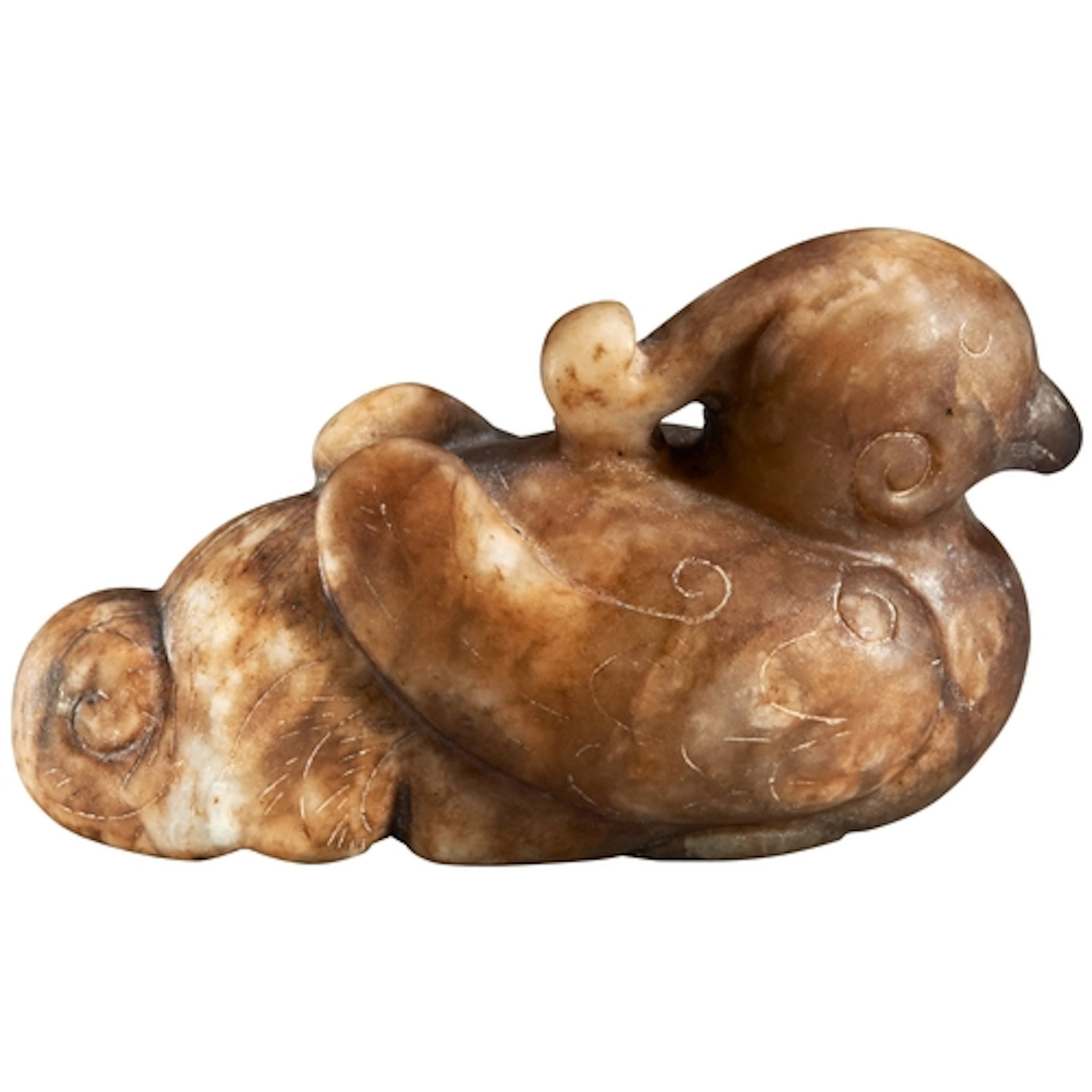 A CARVED RUSSET JADE MANDARIN DUCK QING DYNASTY, 19TH CENTUR...