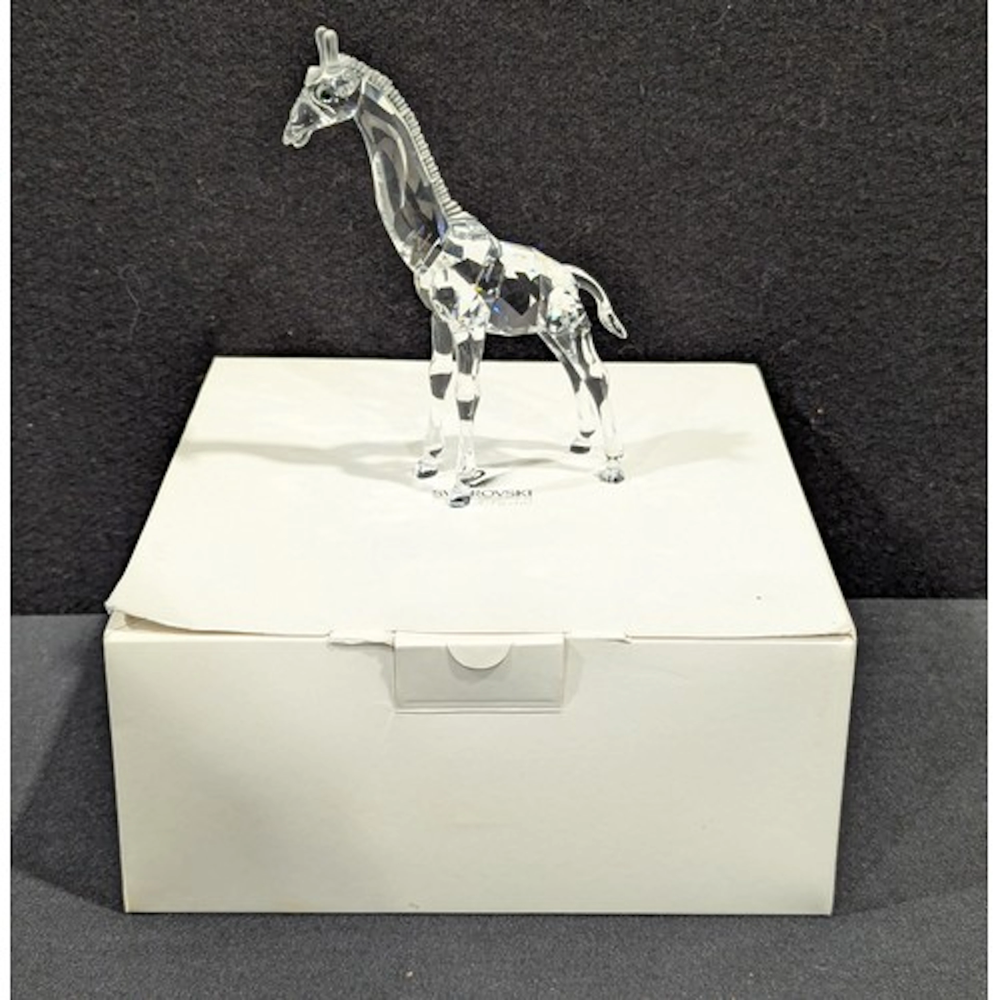 Swarovski silver crystal Giraffe Baby , model 236717, from t...