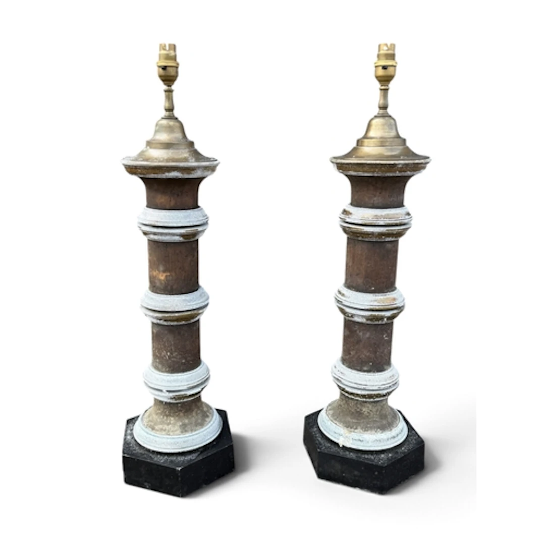 A PAIR OF MID-CENTURY BRONZE COLUMN TABLE LAMPS Mounted on h...