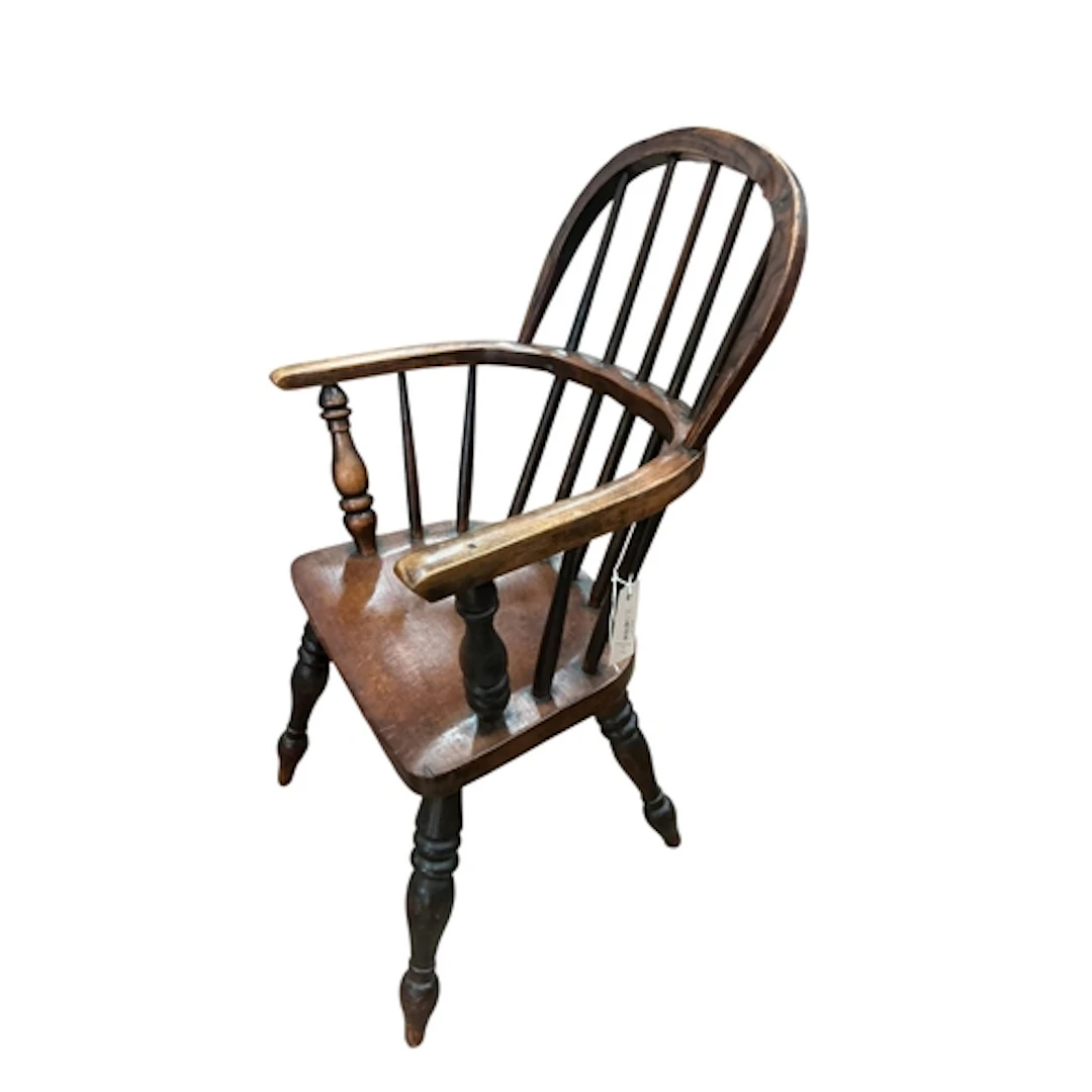 A late 19th century child's ash and fruitwood Windsor chair,...