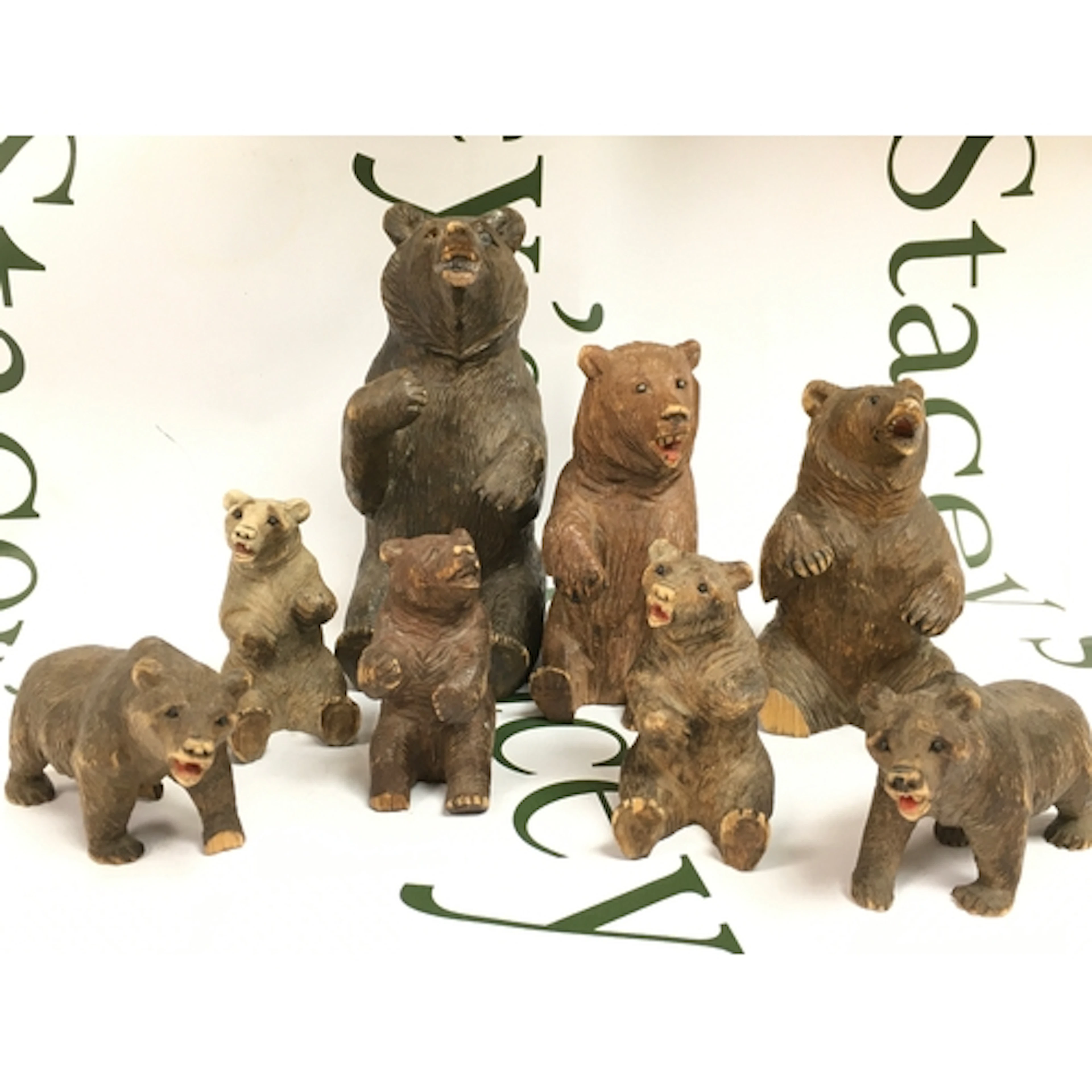 A collection of Black forest carved wooden bears (8) 5.5 to ...