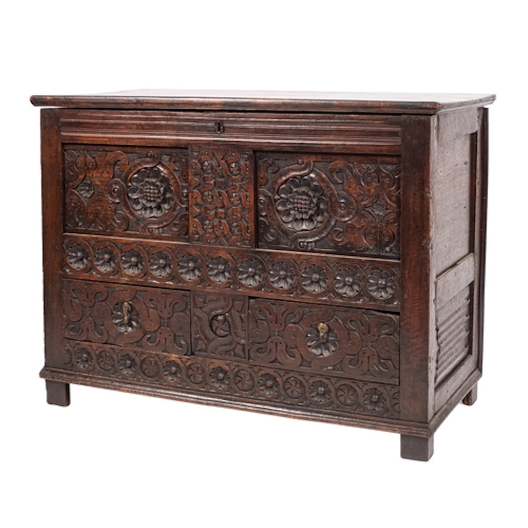 A carved oak mule chest, elements 17th century and later ada...