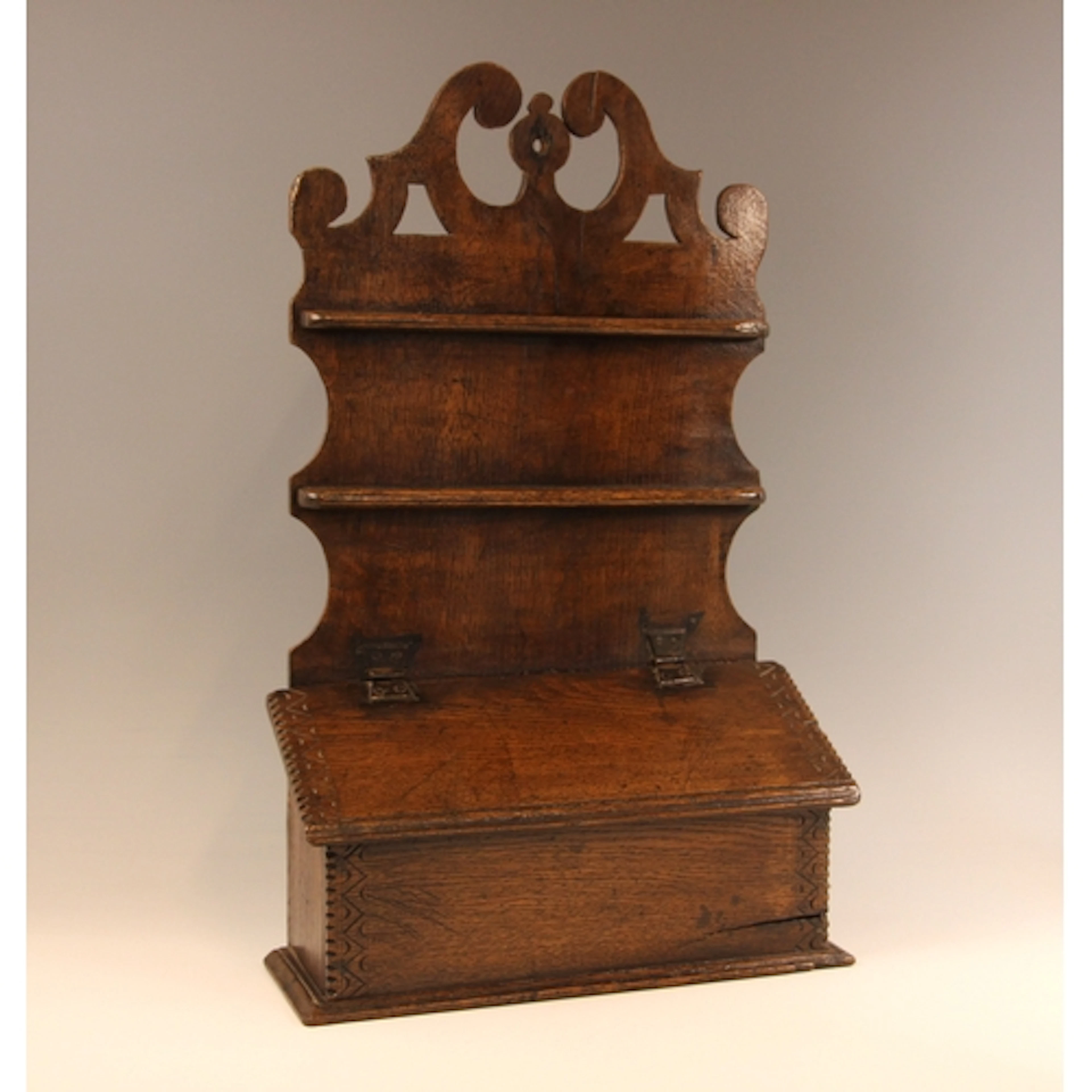A Welsh oak spoon rack and cutlery box, 19th century, the sh...