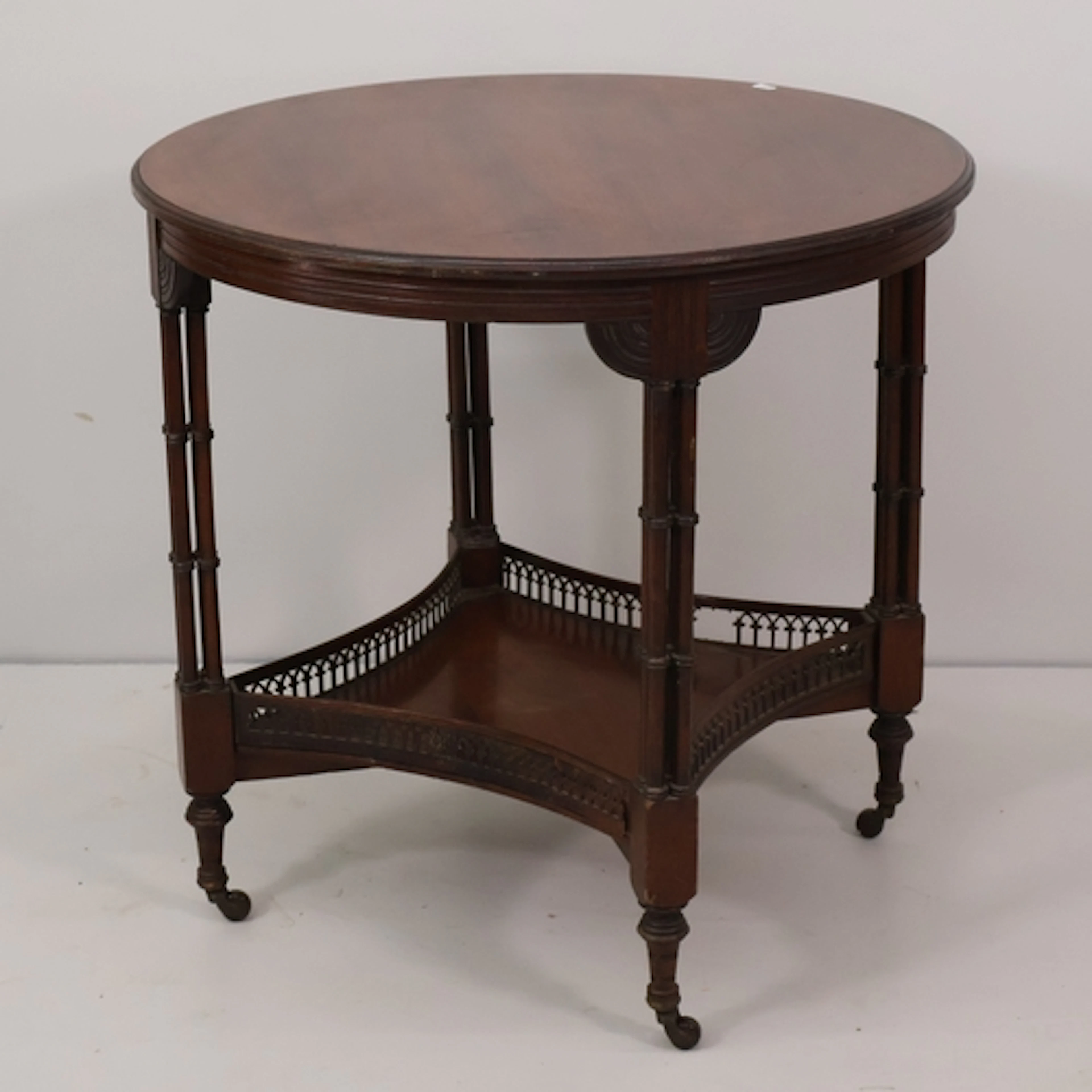 A Chippendale style mahogany two tier circular occasional ta...