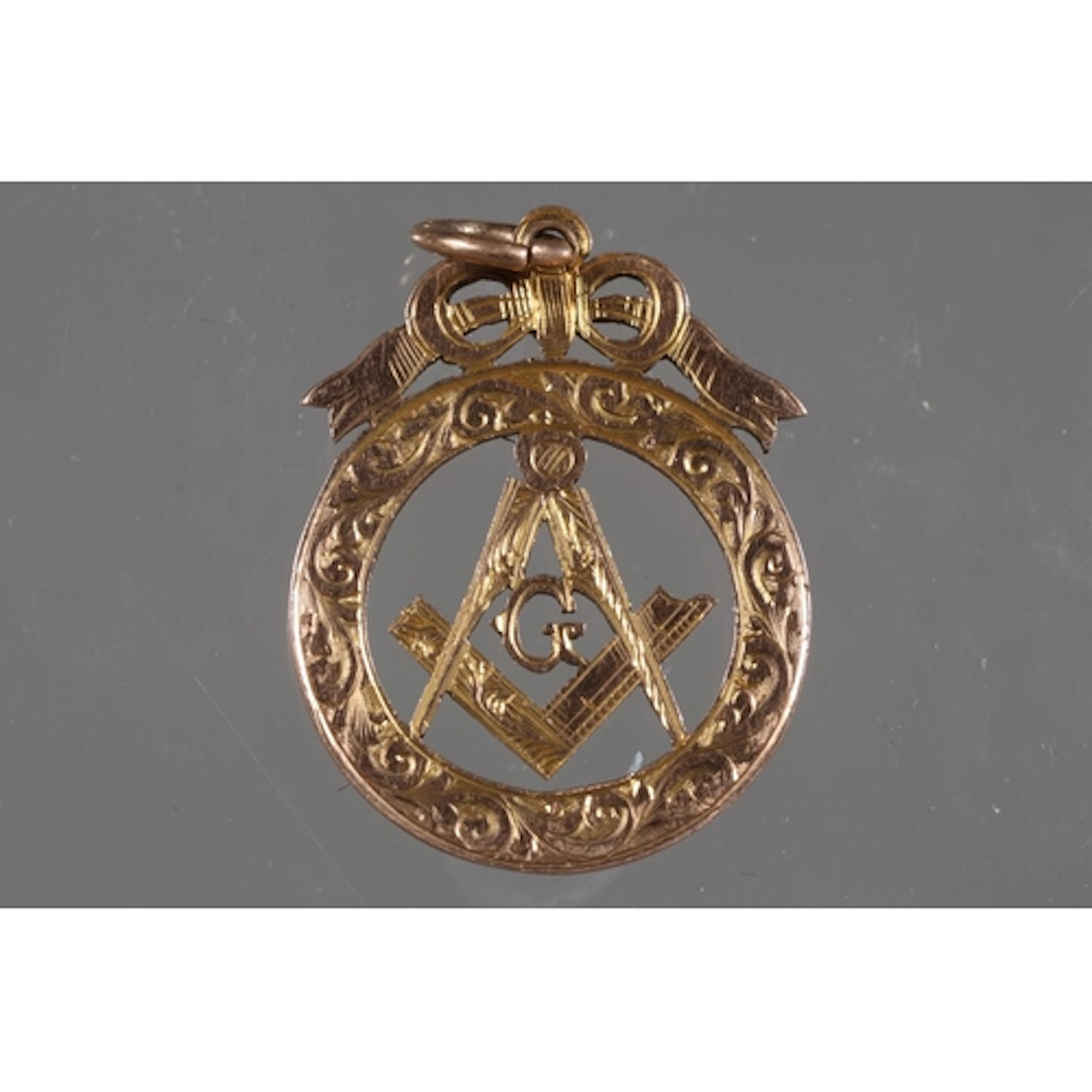 9ct gold Masonic pendant fob medal with G, compass and squar...