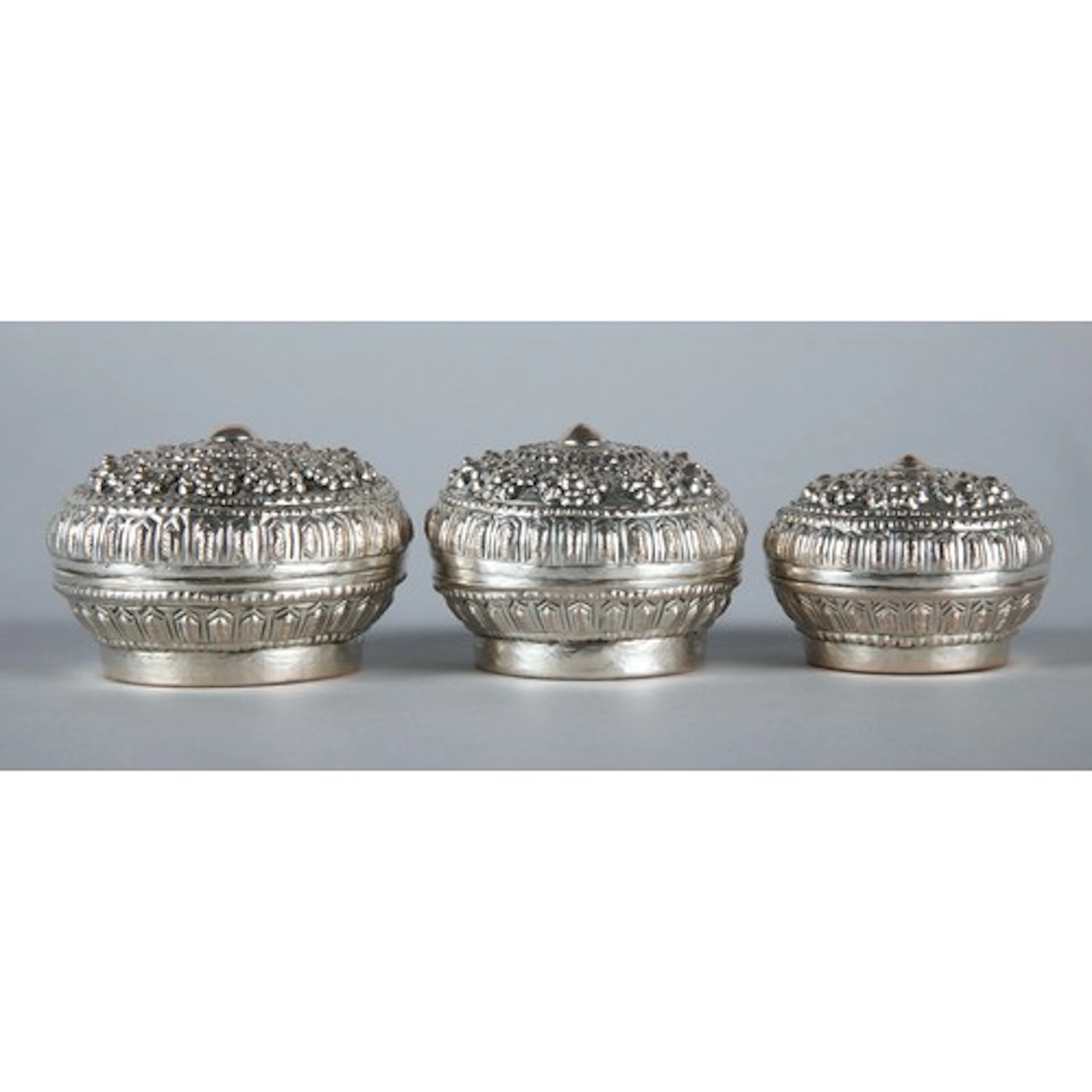 Three matching South Asian silver coloured Sri Lankan style ...