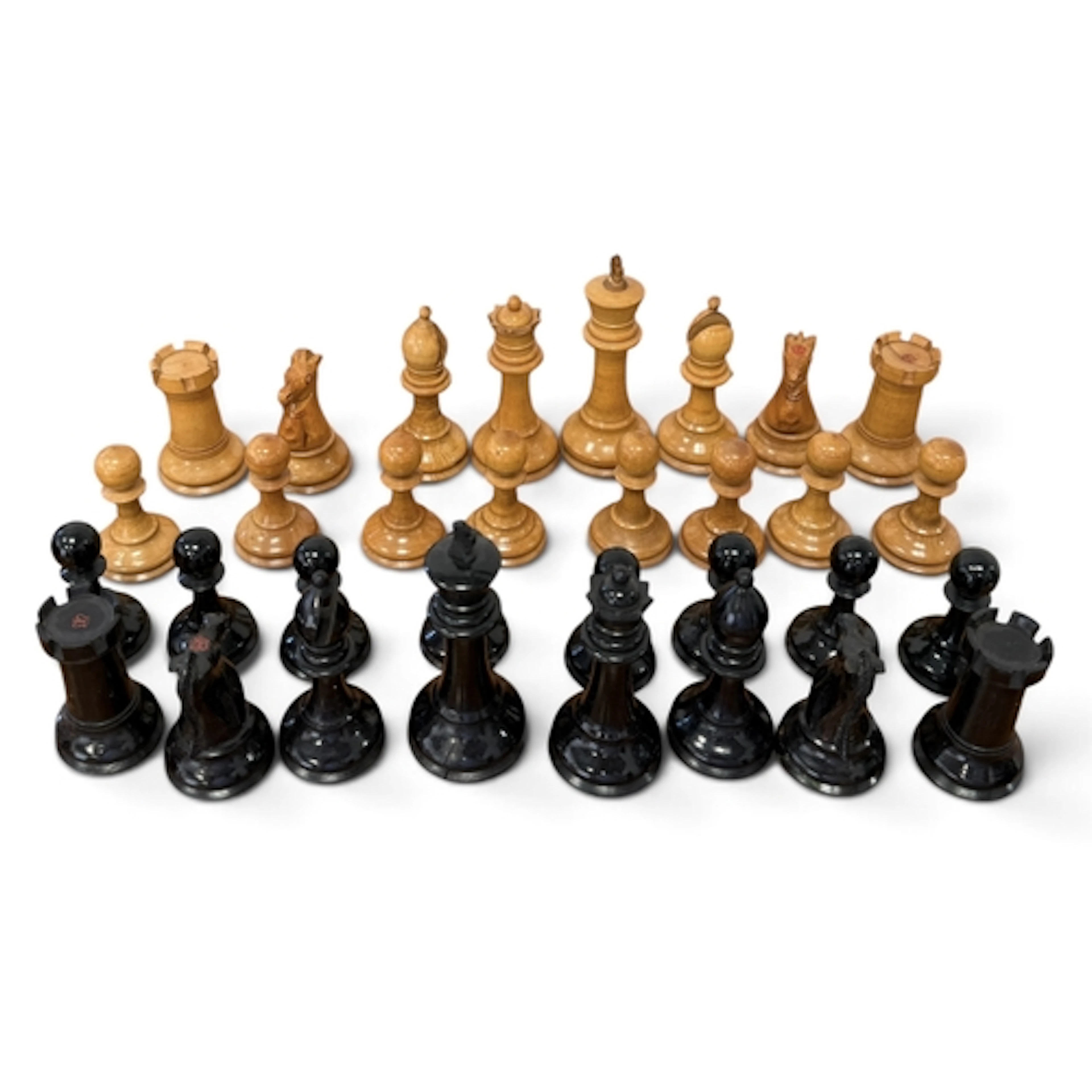 A CARVED WOOD STAUNTON CHESS SET