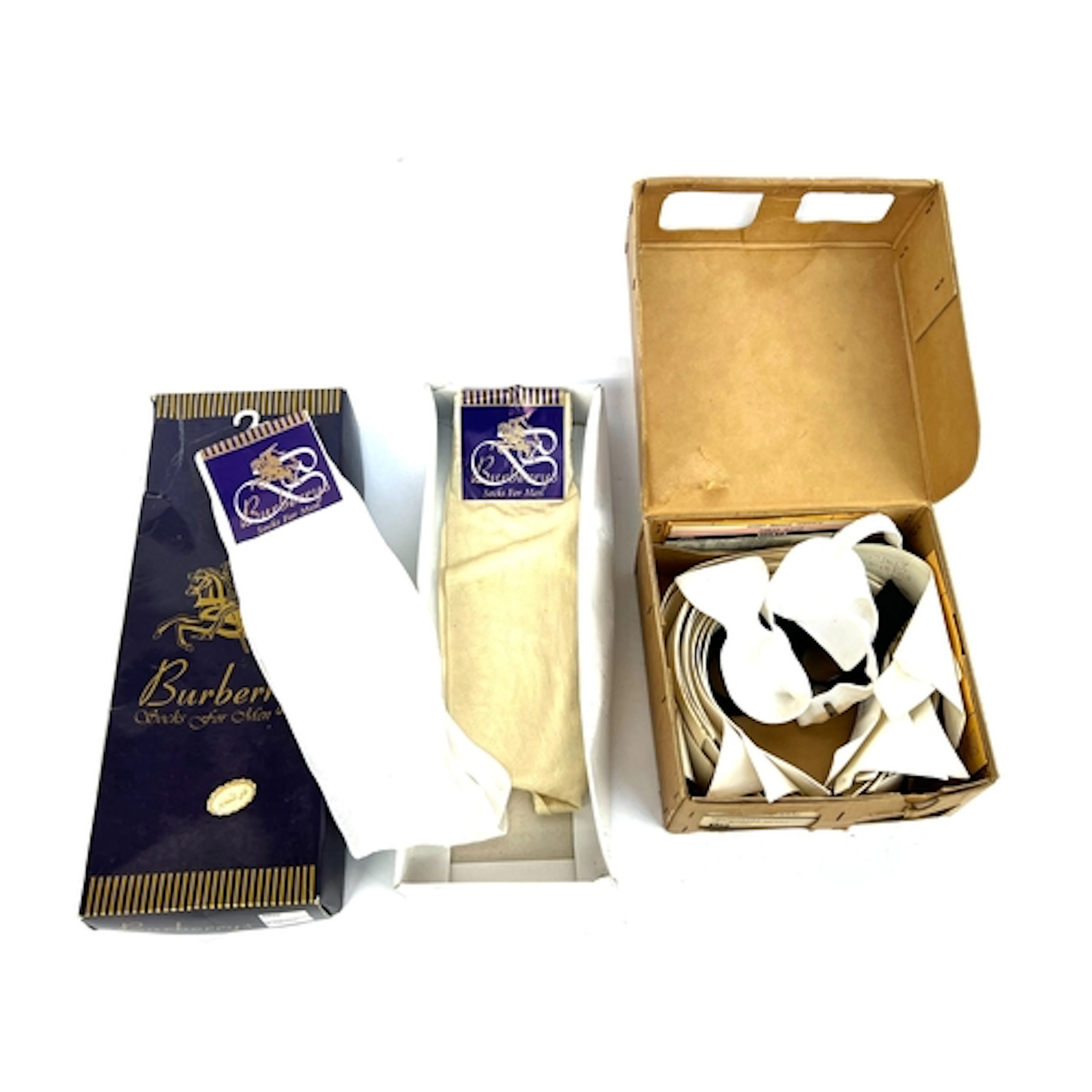 Two pairs of Burberrys silk socks, in box; together with a q...