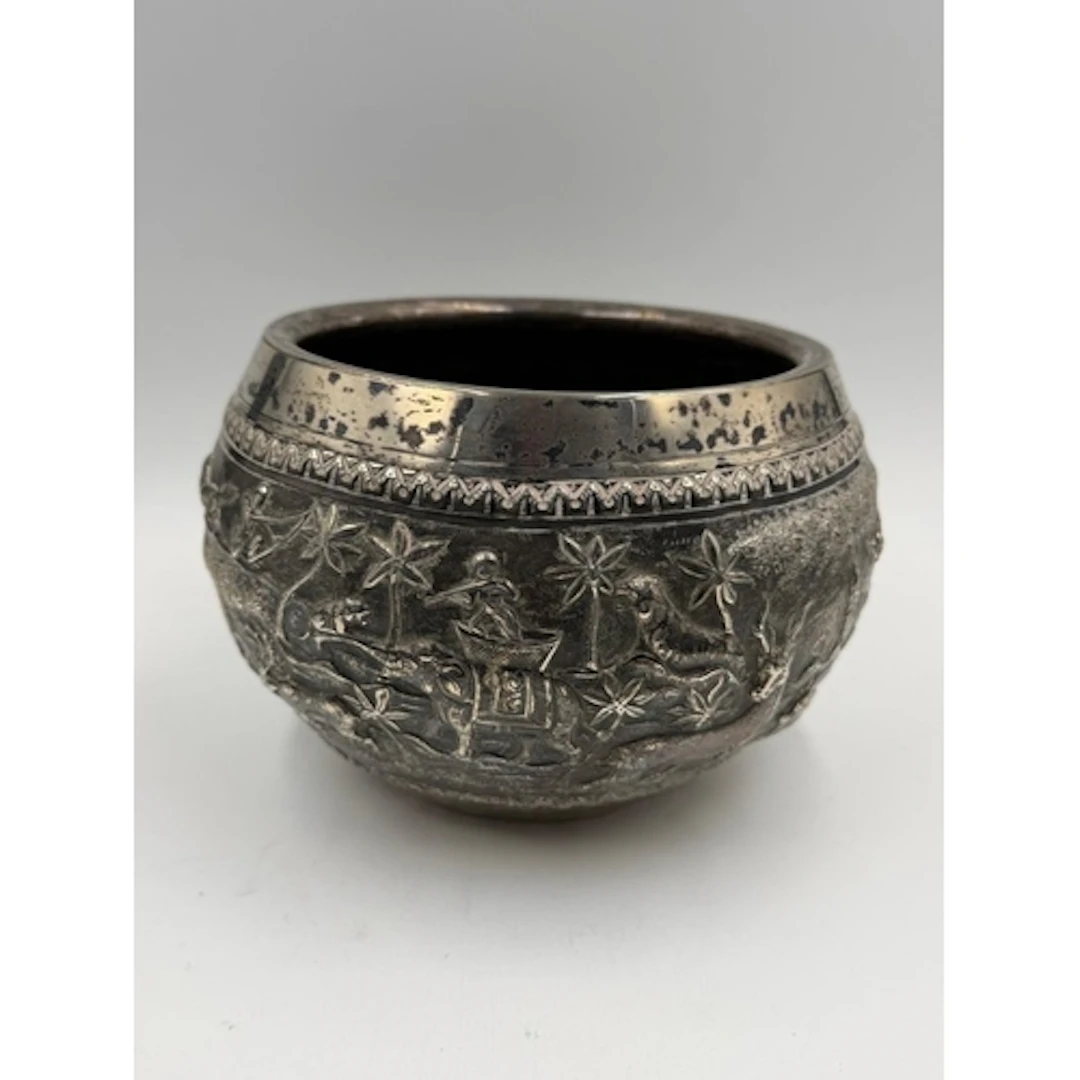 An Indian silver bowl with animal decoration, approximately ...