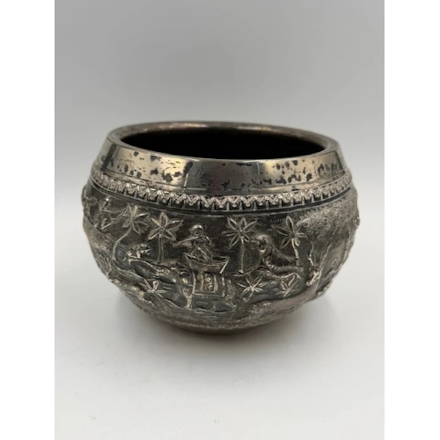An Indian silver bowl with animal decoration, approximately ...