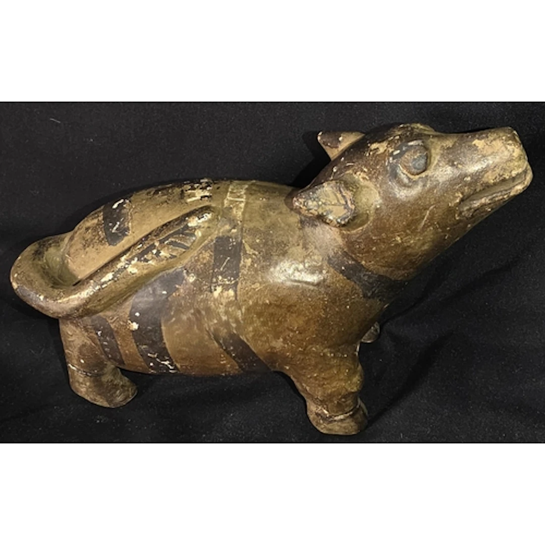 A South American antique figure of a four legged animal, len...