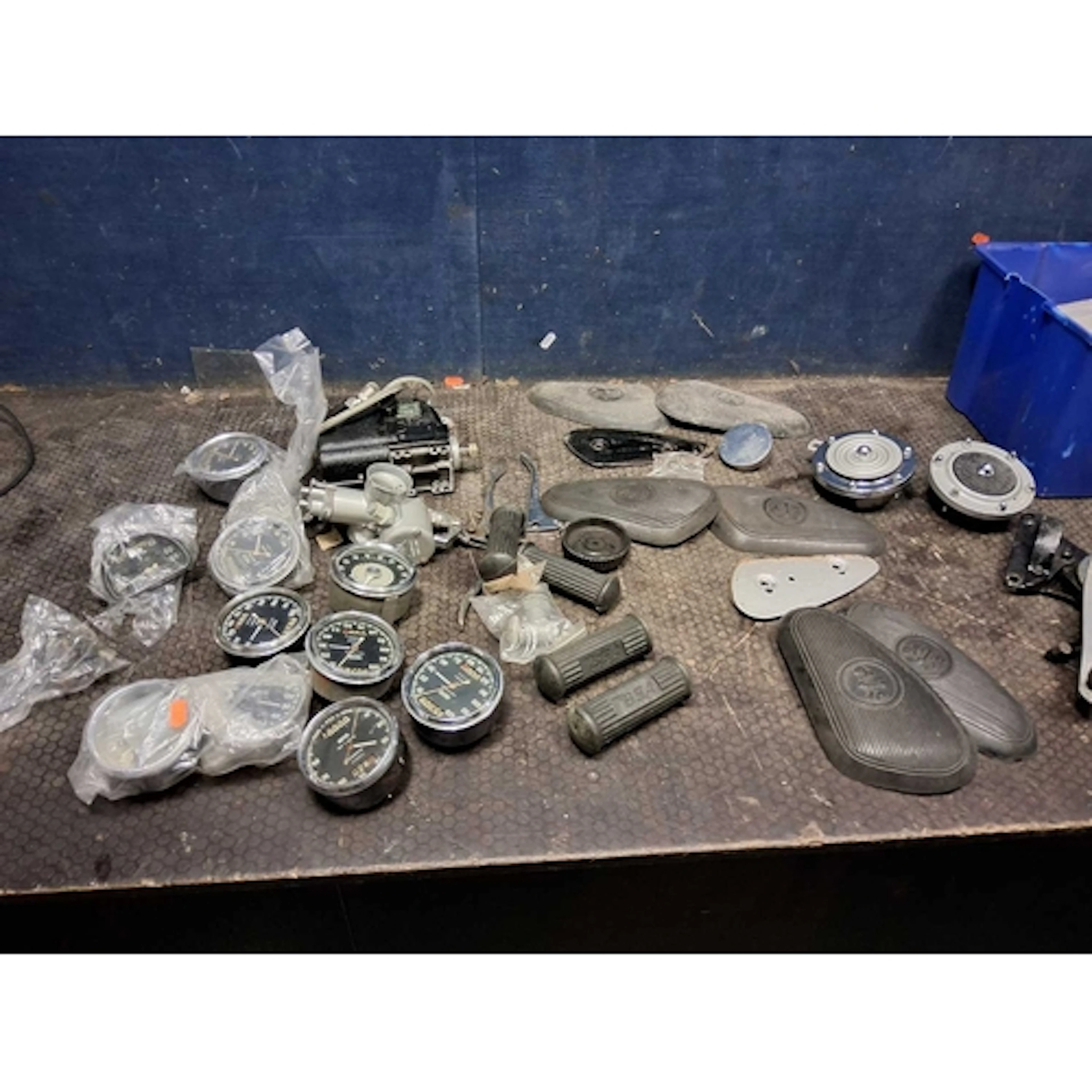 A TRAY CONTAINING VINTAGE MOTORCYCLE PARTS including two pai...