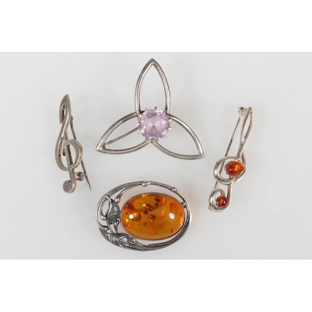 Scottish silver triquetra brooch with pale faceted amethyst ...