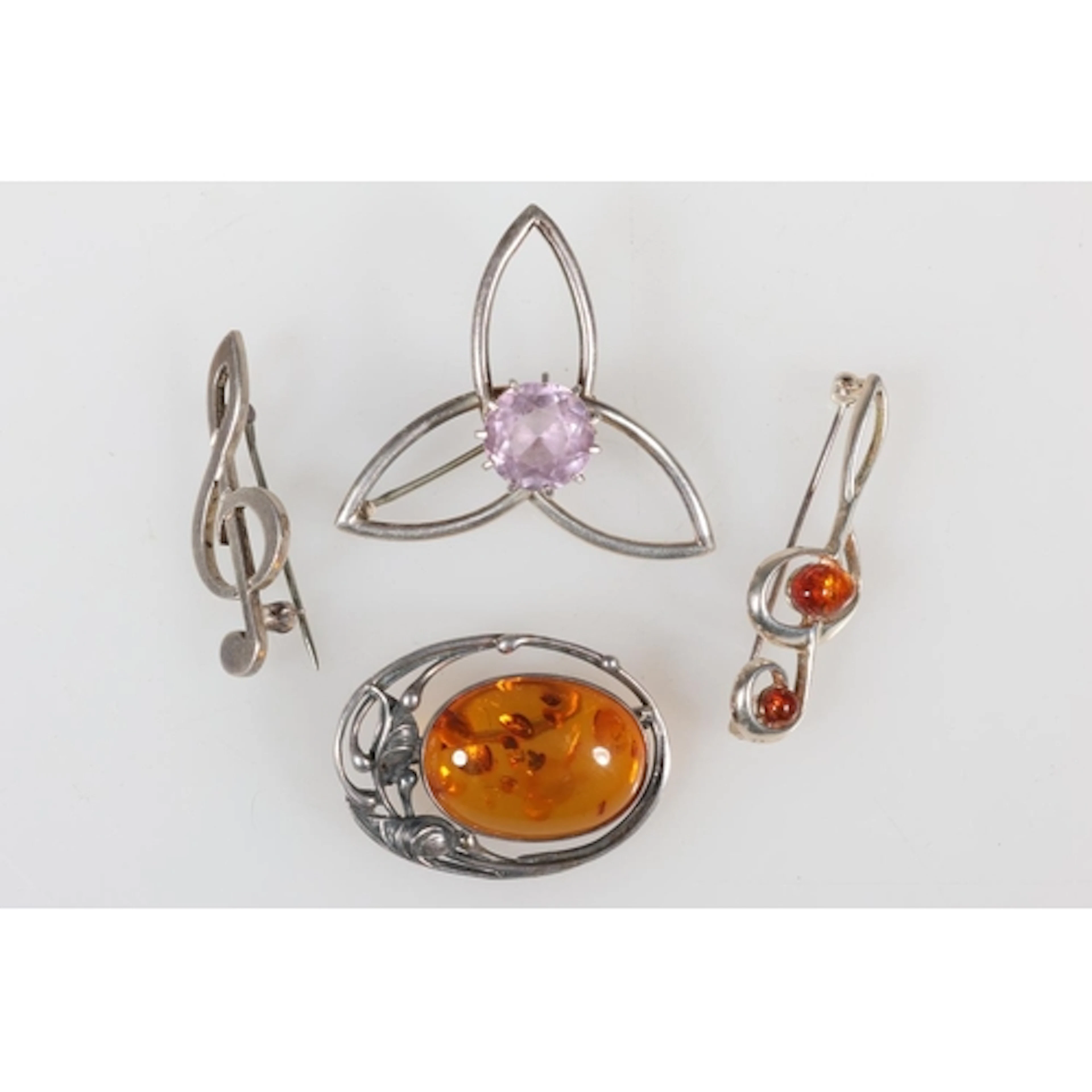Scottish silver triquetra brooch with pale faceted amethyst ...