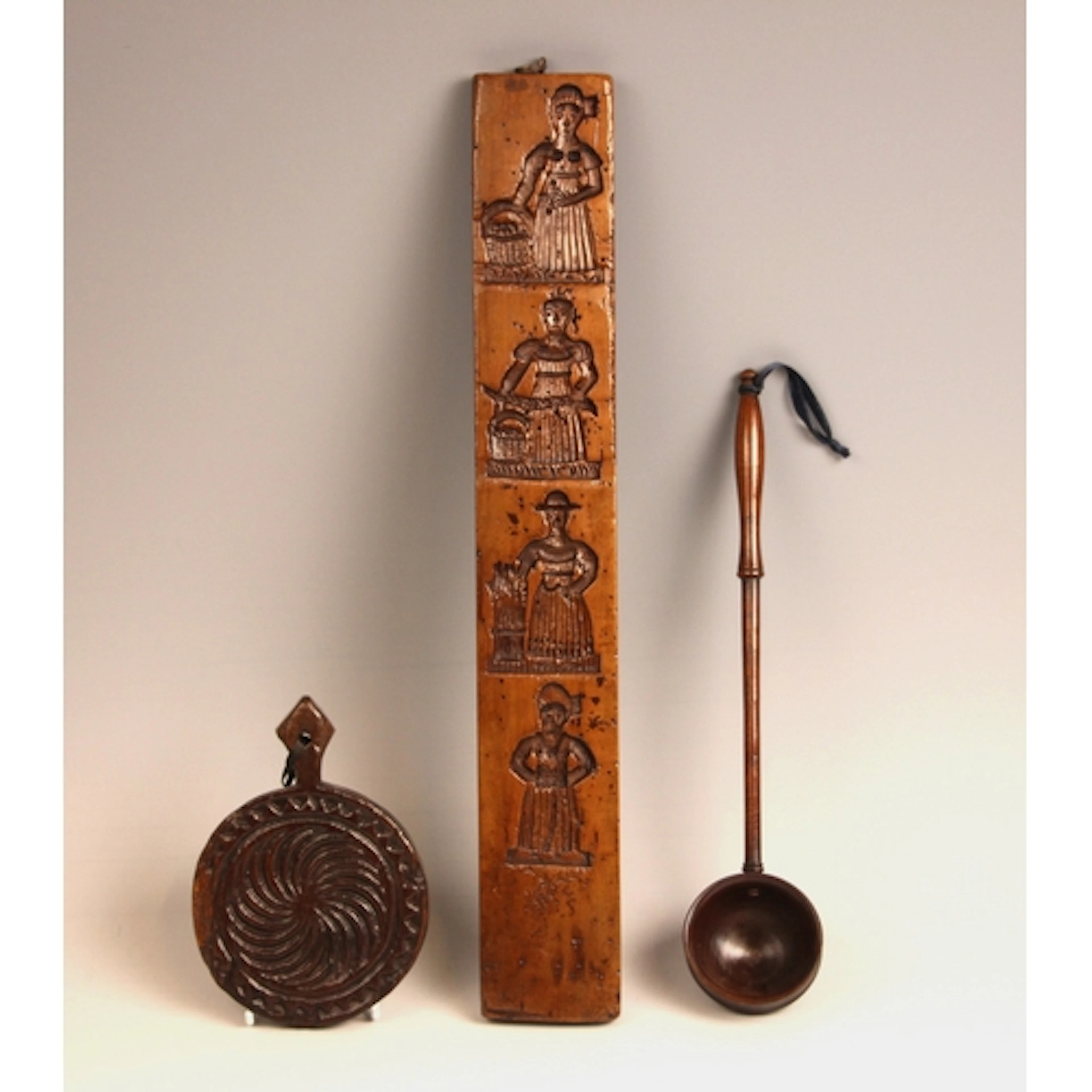 A treen toddy or punch ladle, 19th century, of typical form,...