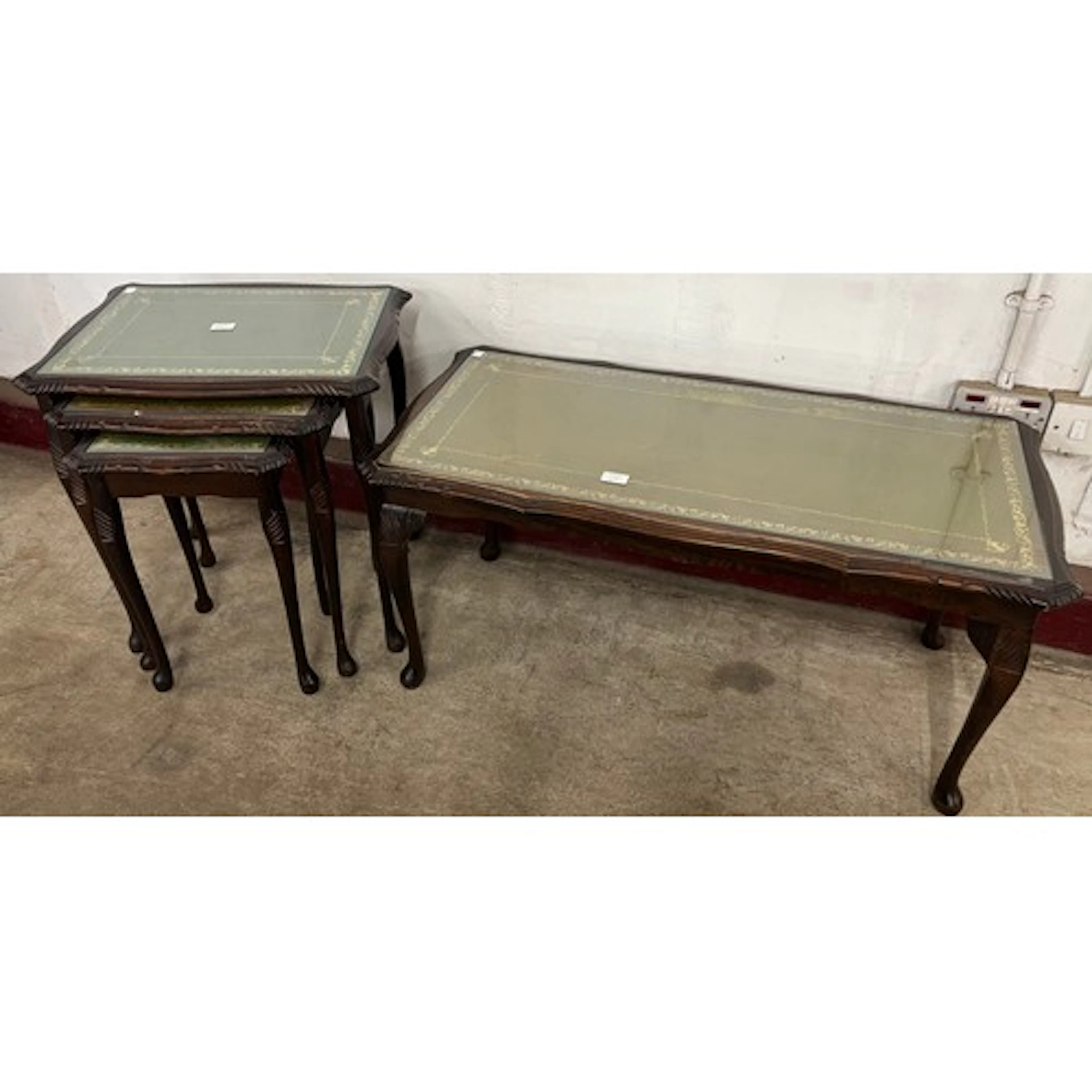 A Queen Anne style mahogany and green leather topped coffee ...