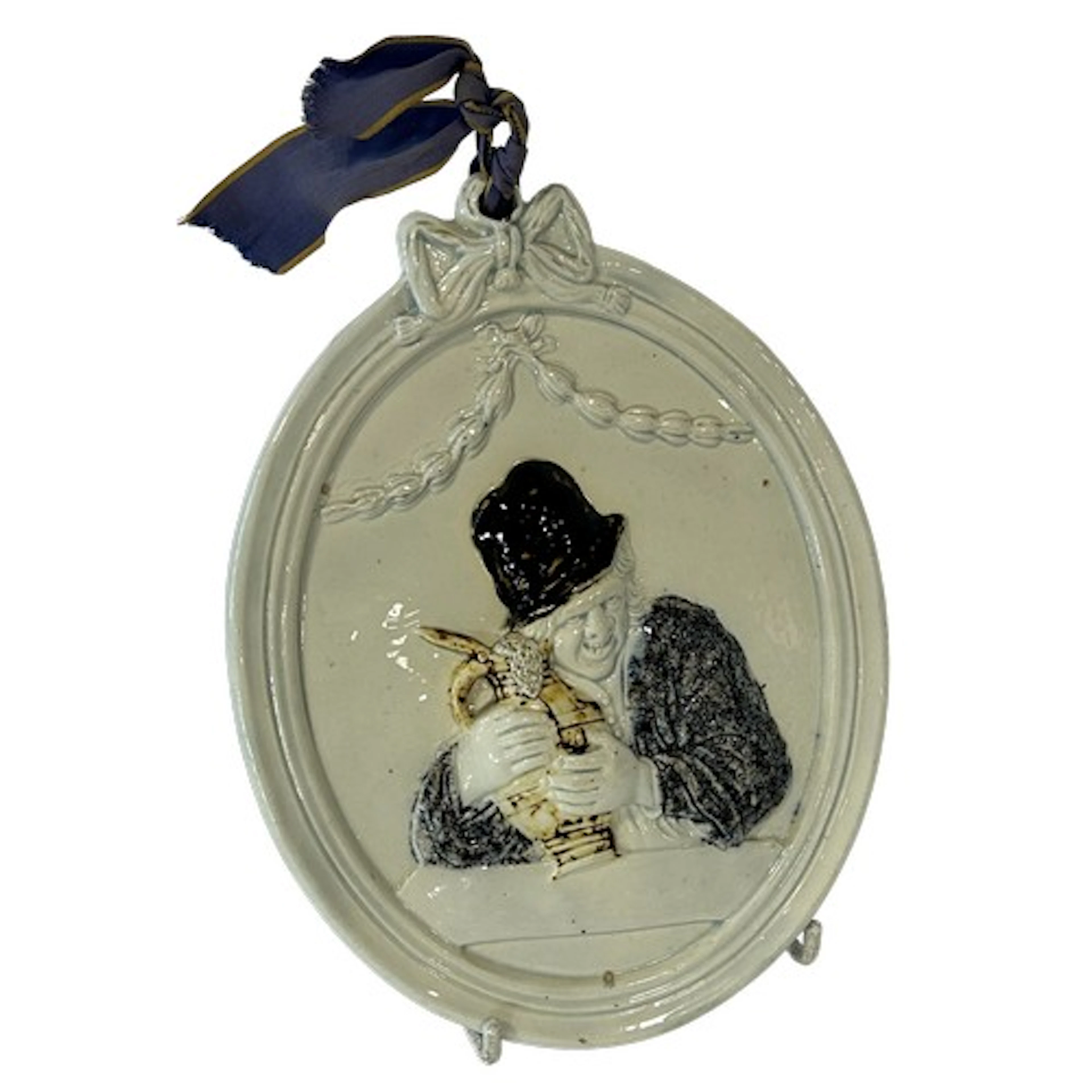 An 18th century Prattware plaque, - A drunken man holding a ...