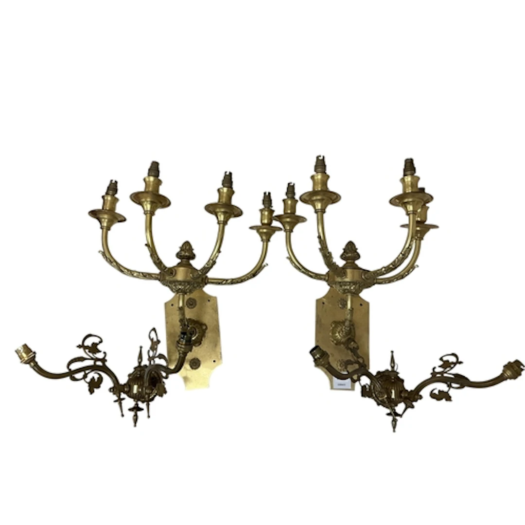 A pair of Victorian style cast brass four branch wall lights...