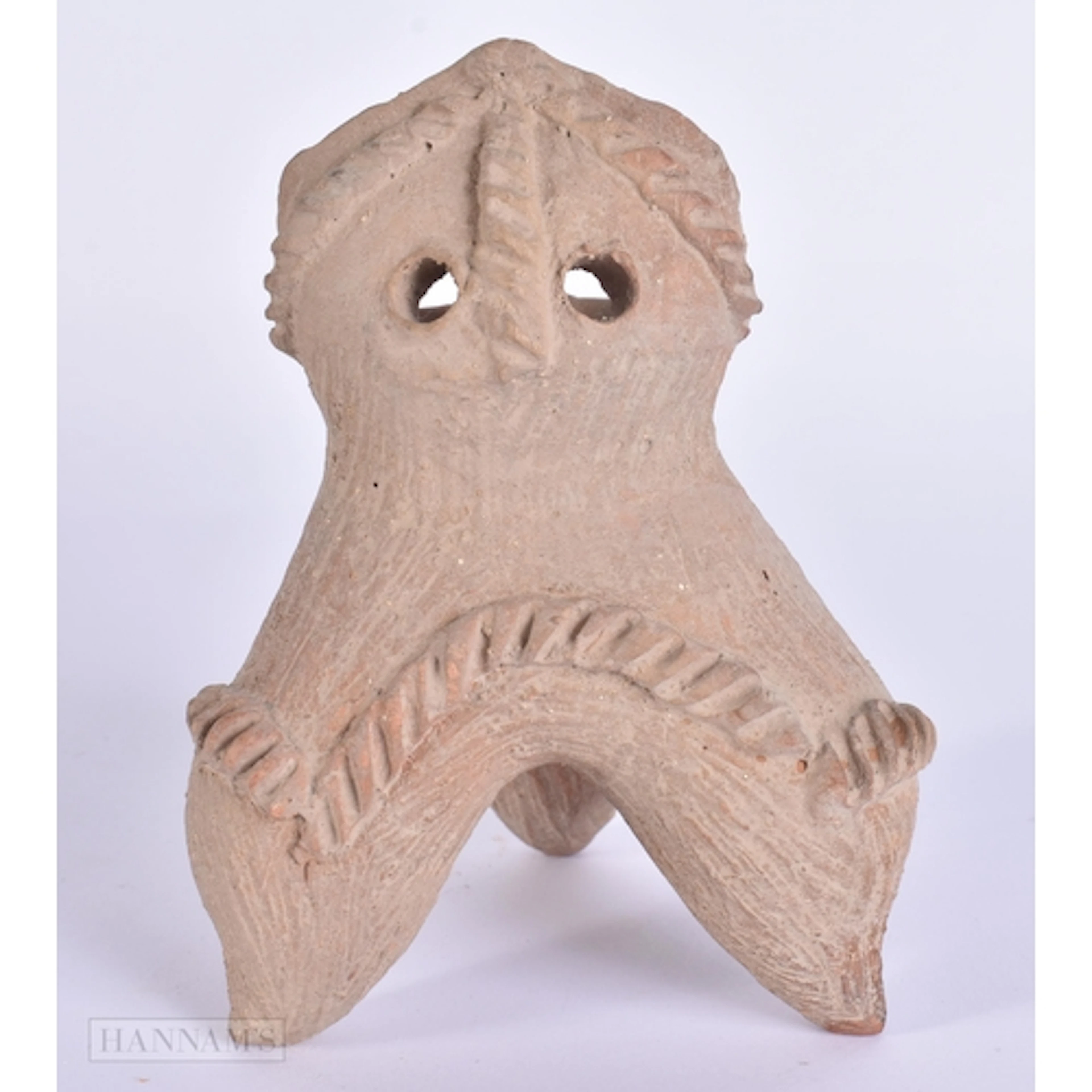 A CHINESE NEOLITHIC LONGSHAN CULTURE ZOOMORPHIC VESSEL. 14 c...
