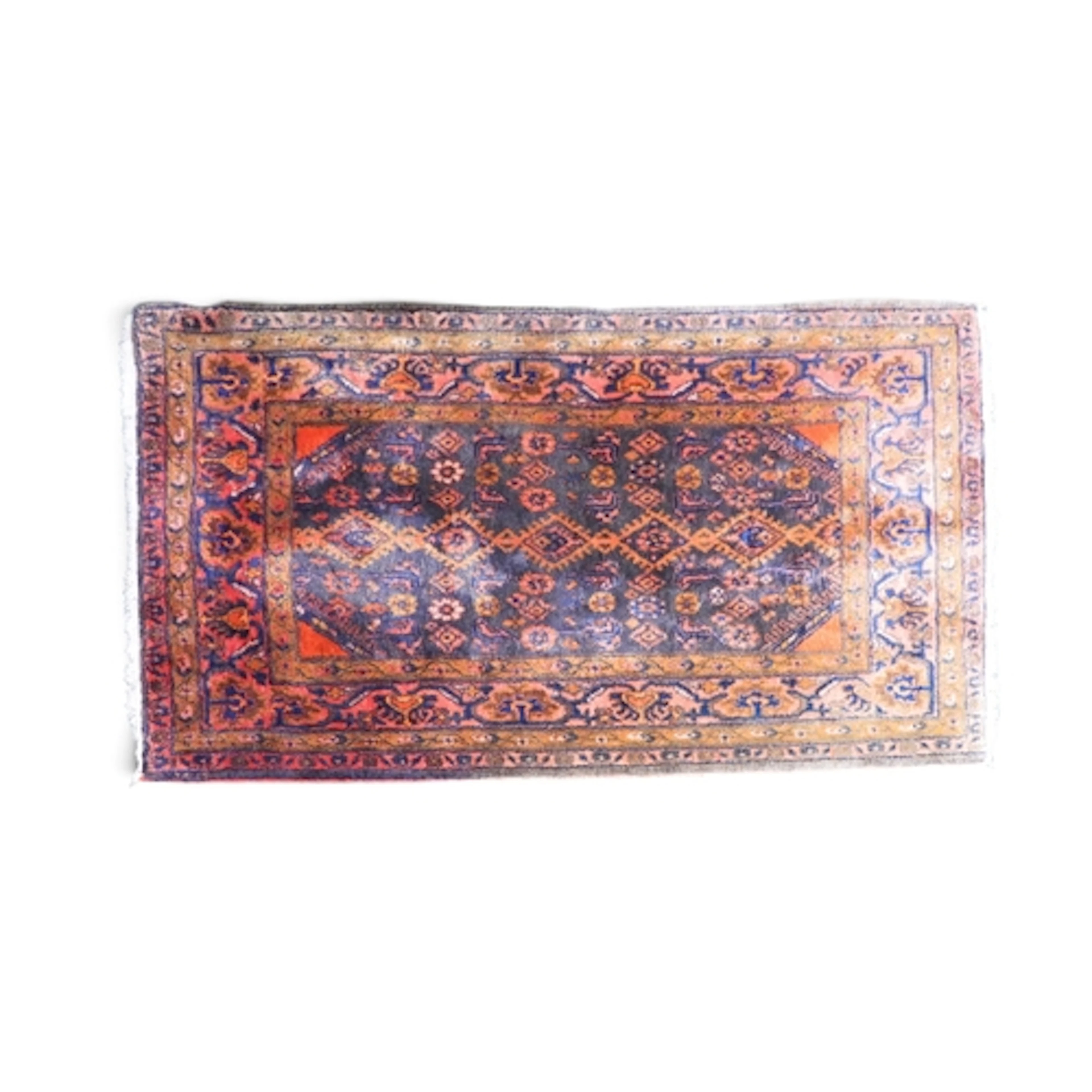 A blue ground Hamadan rug with multicoloured geometric patte...