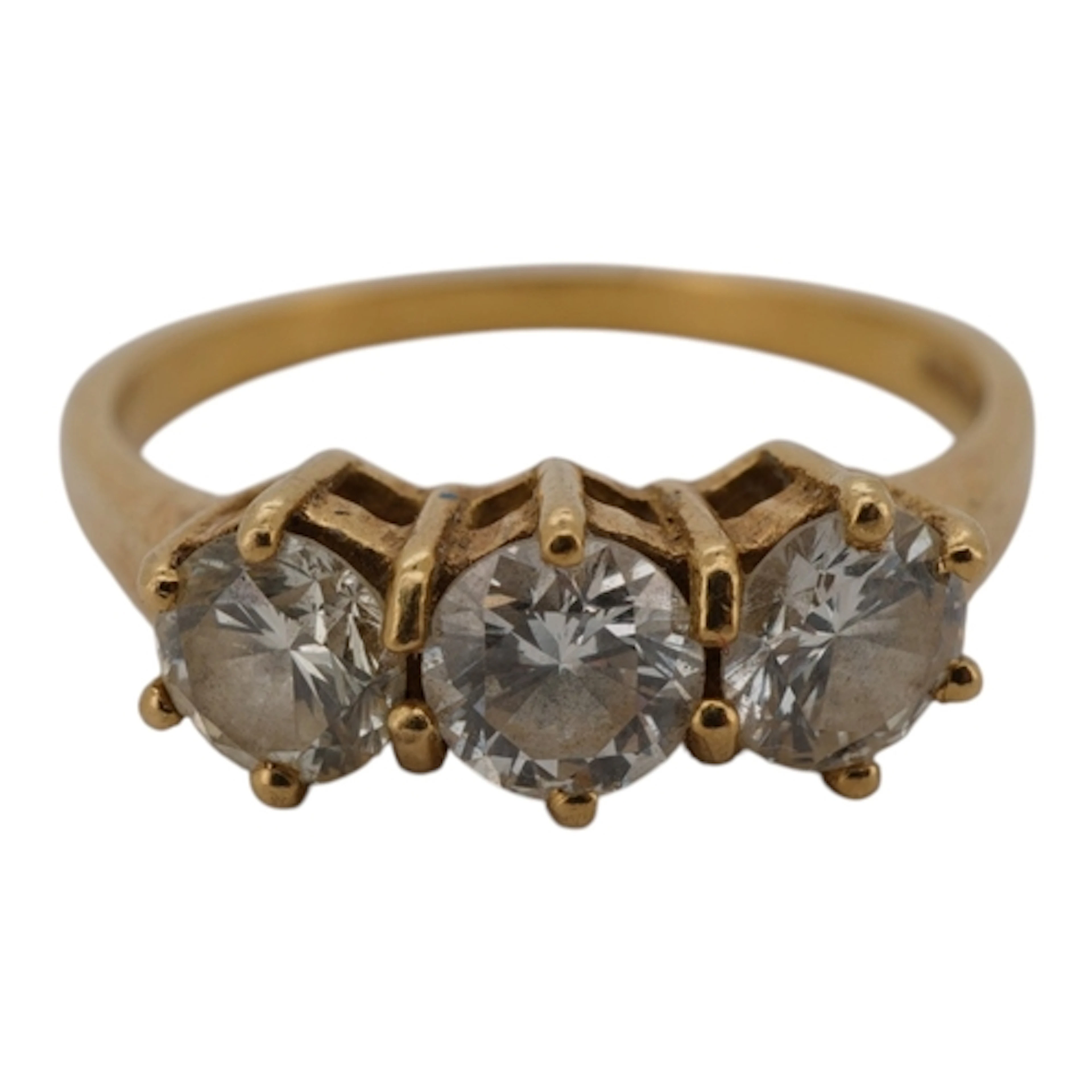 A three-stone diamond ring, set with three brilliant-cut dia...