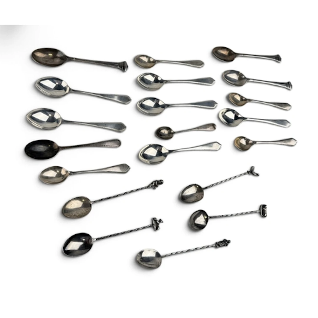 A COLLECTION OF SILVER TEASPOONS To include some examples by...
