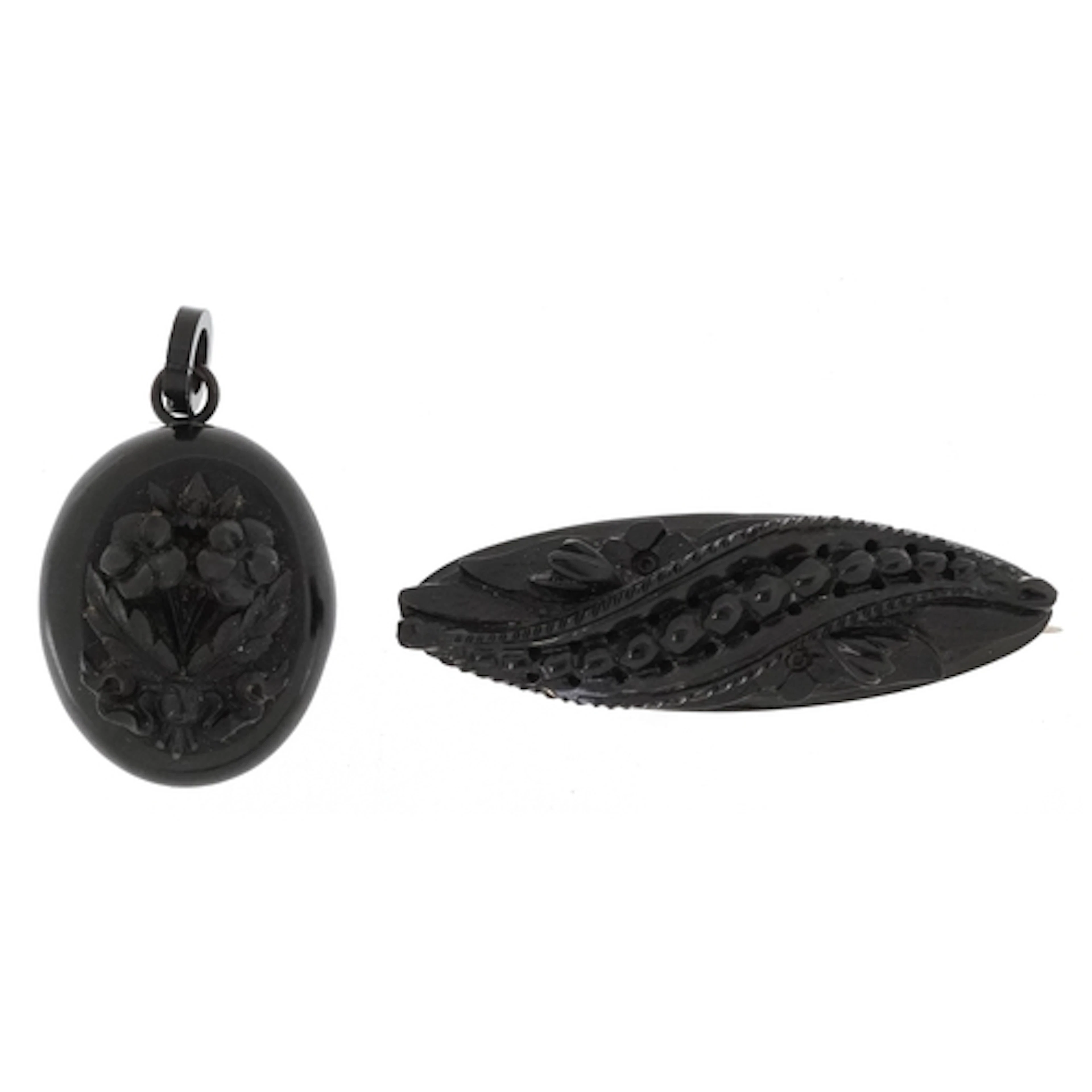 Victorian jet mourning locket carved in relief with flowers ...