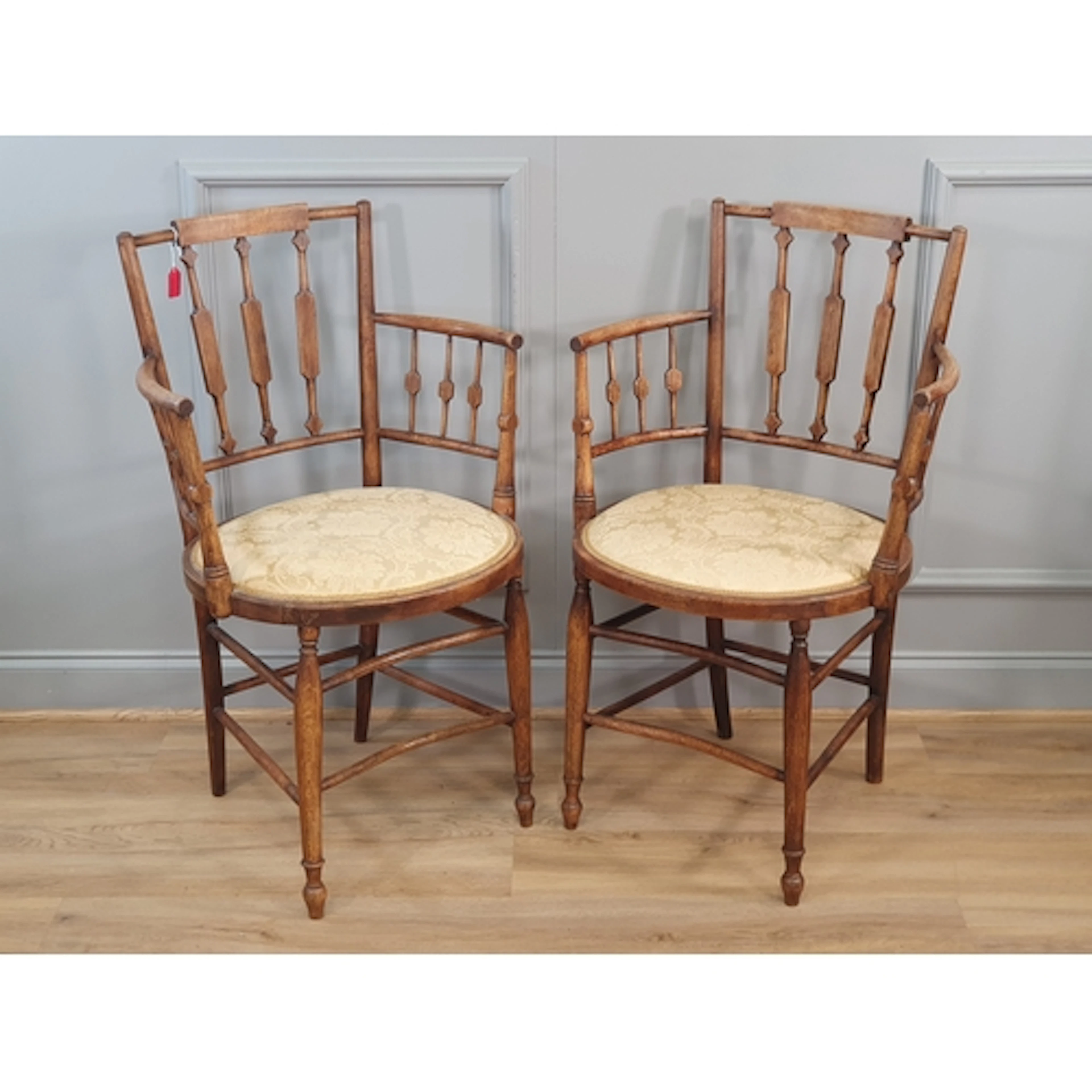 A pair of Arts and Crafts Armchairs in the manner of The Gar...