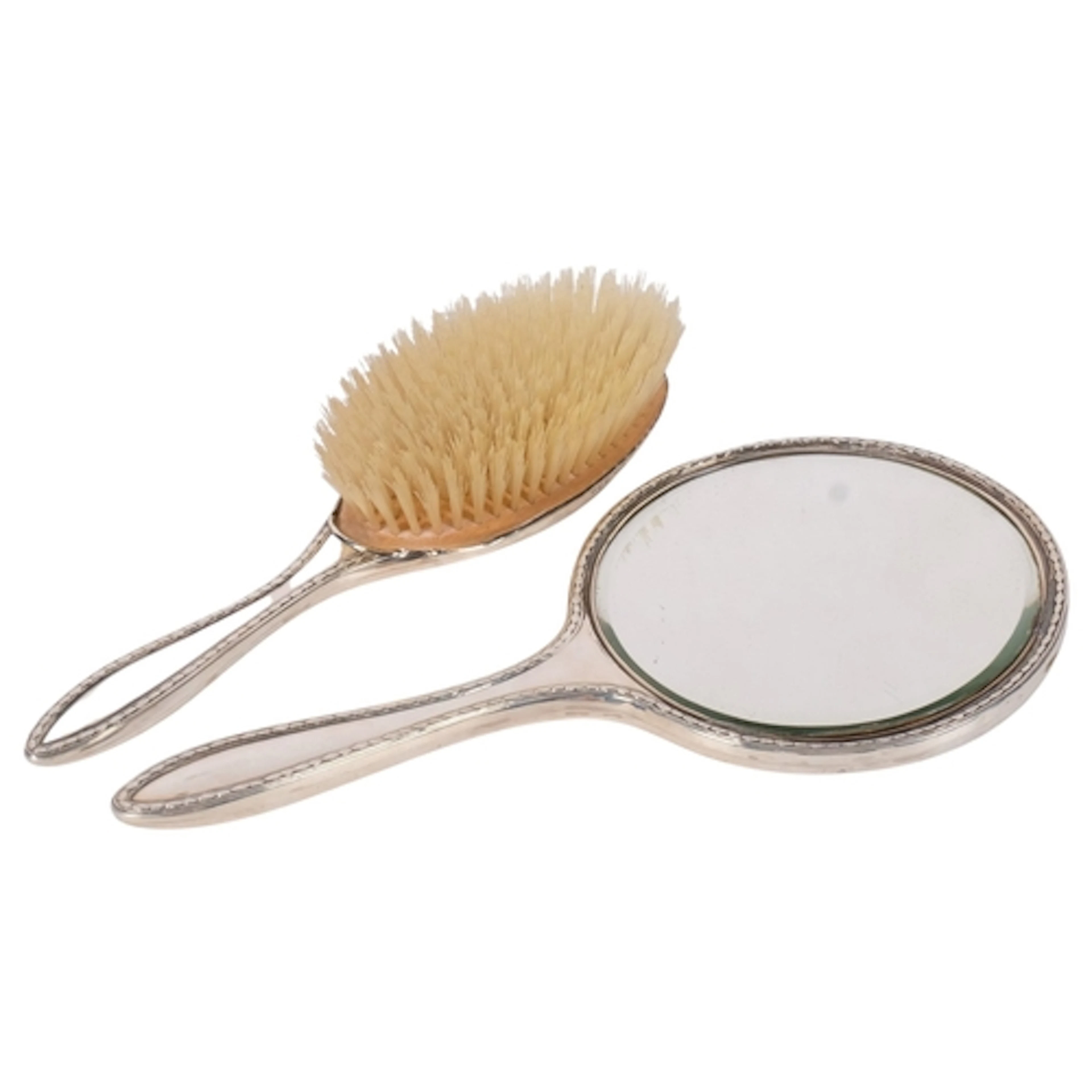 A 2-piece silver-backed dressing table set, comprising hand ...