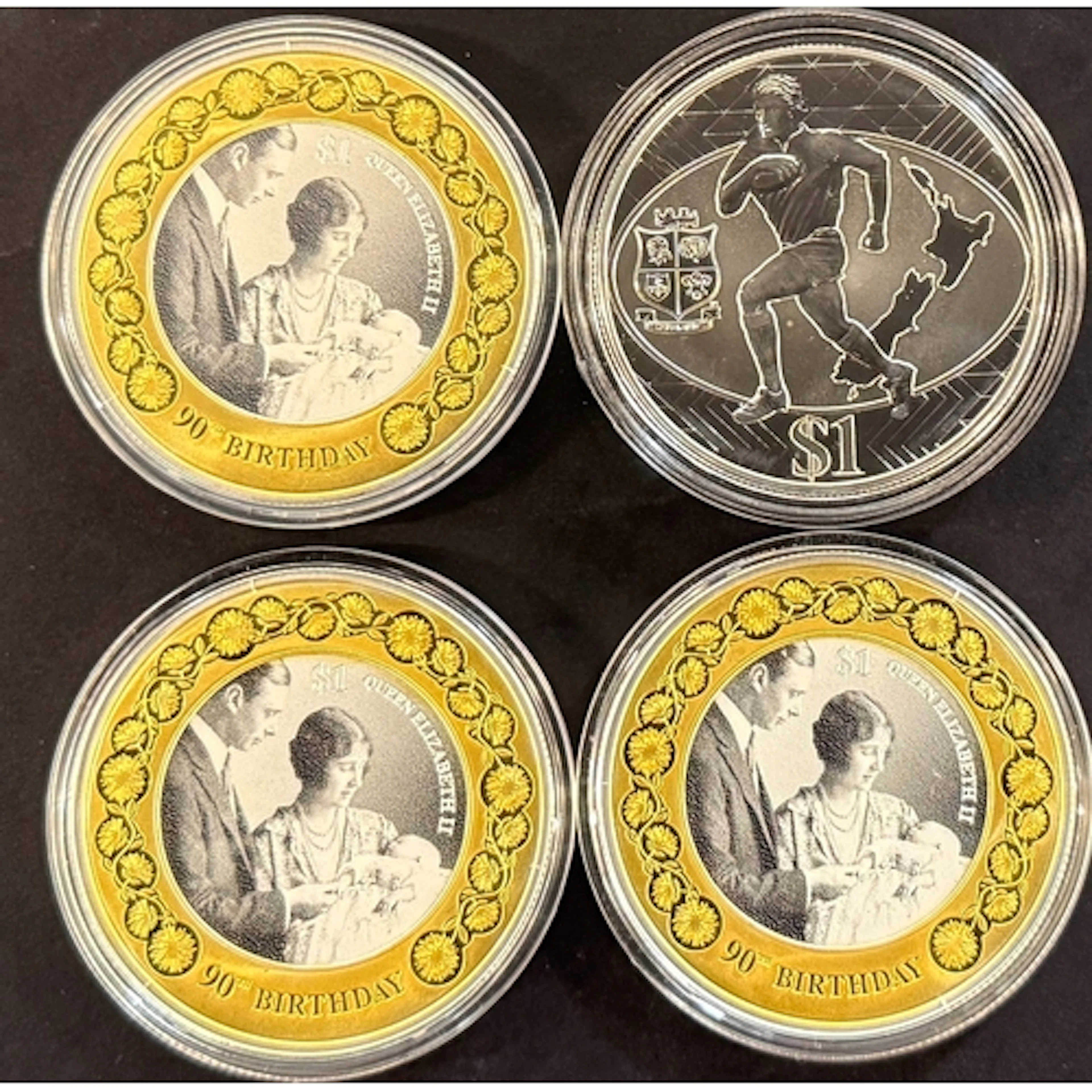 A group of four New Zealand silver proof $1 coins, comprisin...