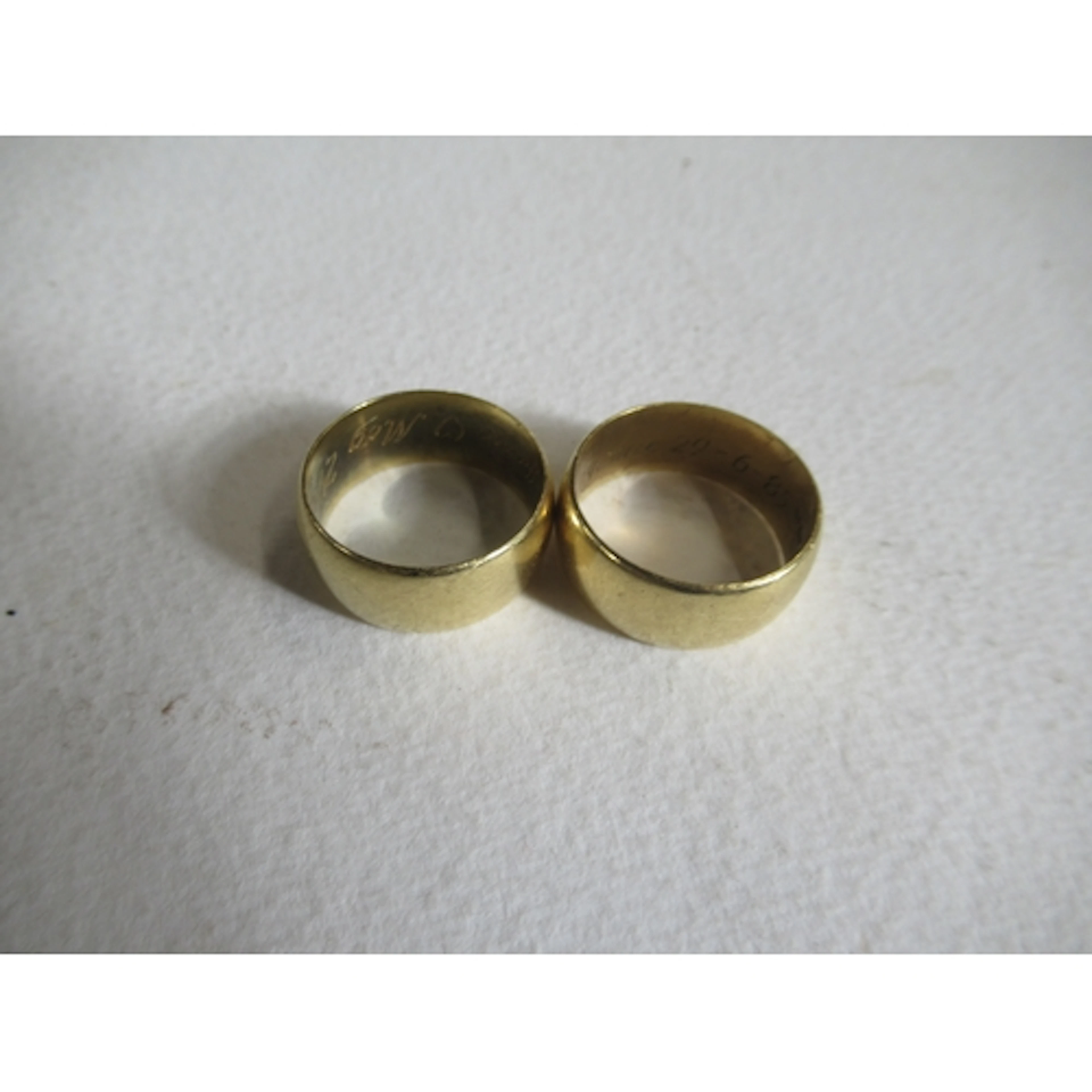 Two 18ct gold wedding bands, marked 750, weight 22.3g