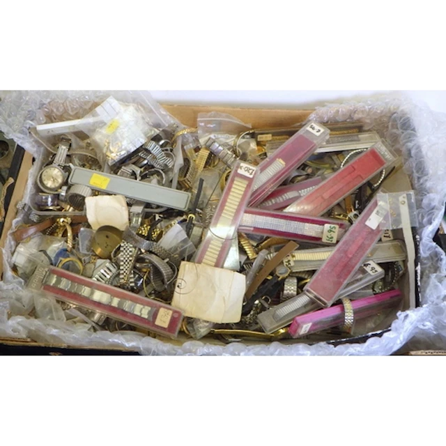 A large qty of watch parts