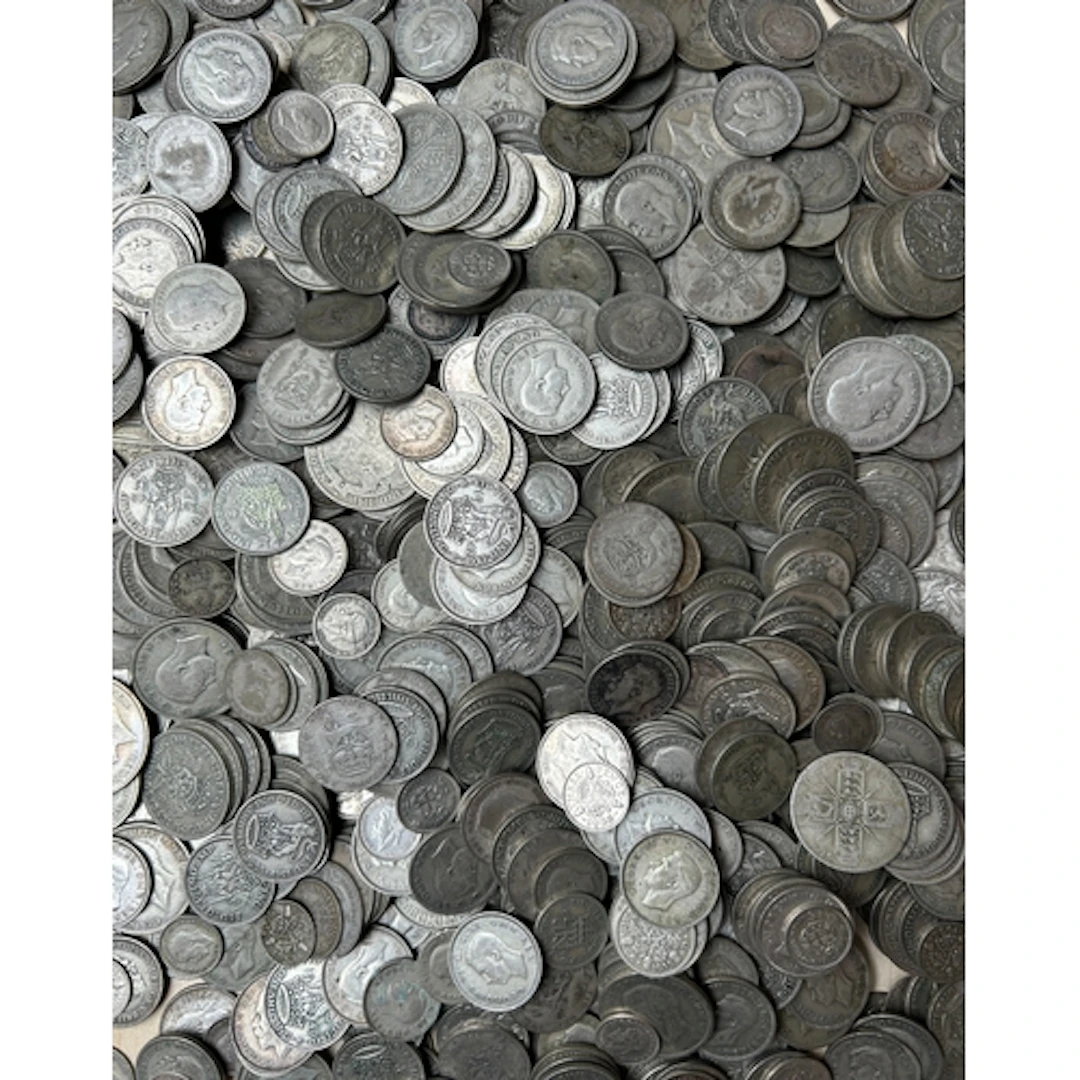 A collection of circulated UK pre-1947 silver coins, denomin...