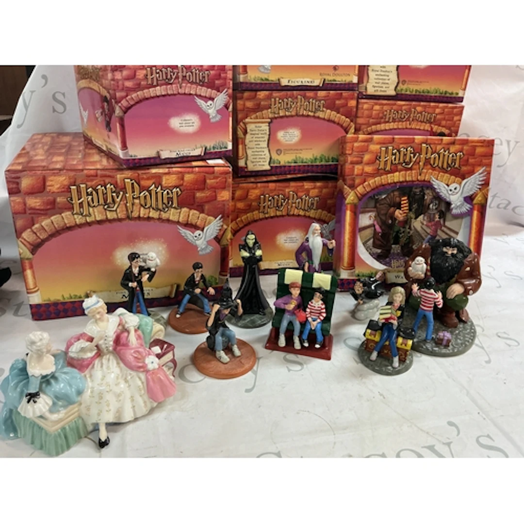 A collection of boxed Harry Potter Royal Doulton figures and...