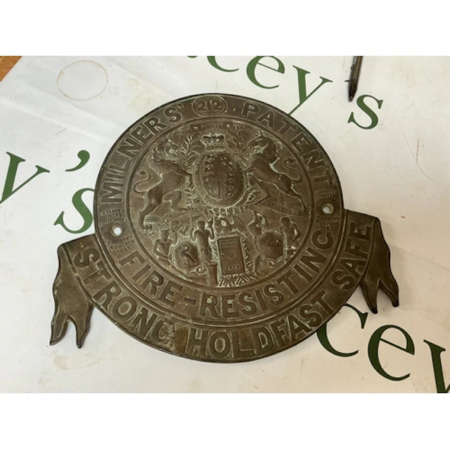 an original cast brass/bronze makers plaque for millers pate...